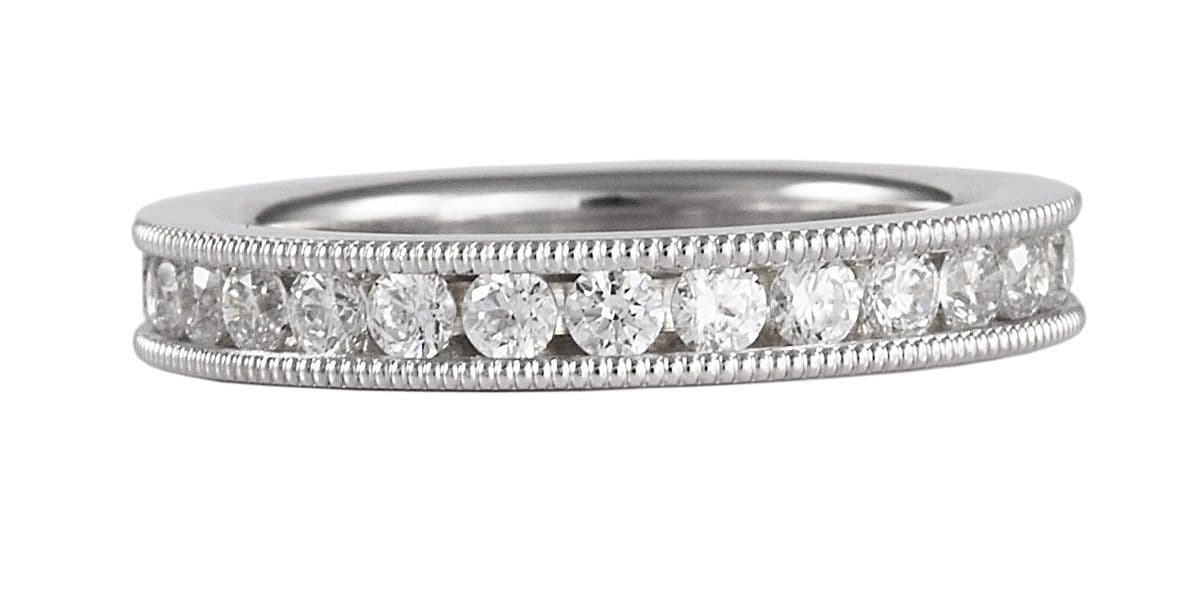 White Gold Eternity Ring Diamond Channel Setting And Grain Effect Patterned Edging