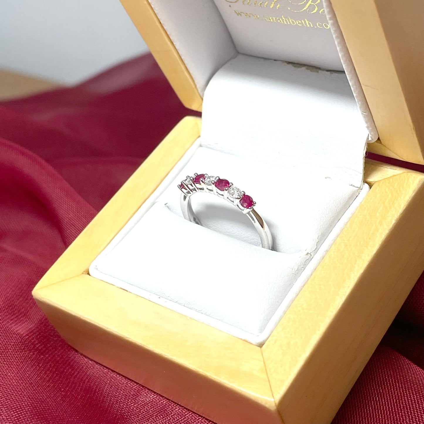 White Gold Round Ruby And Diamond Claw Set Eternity Ring