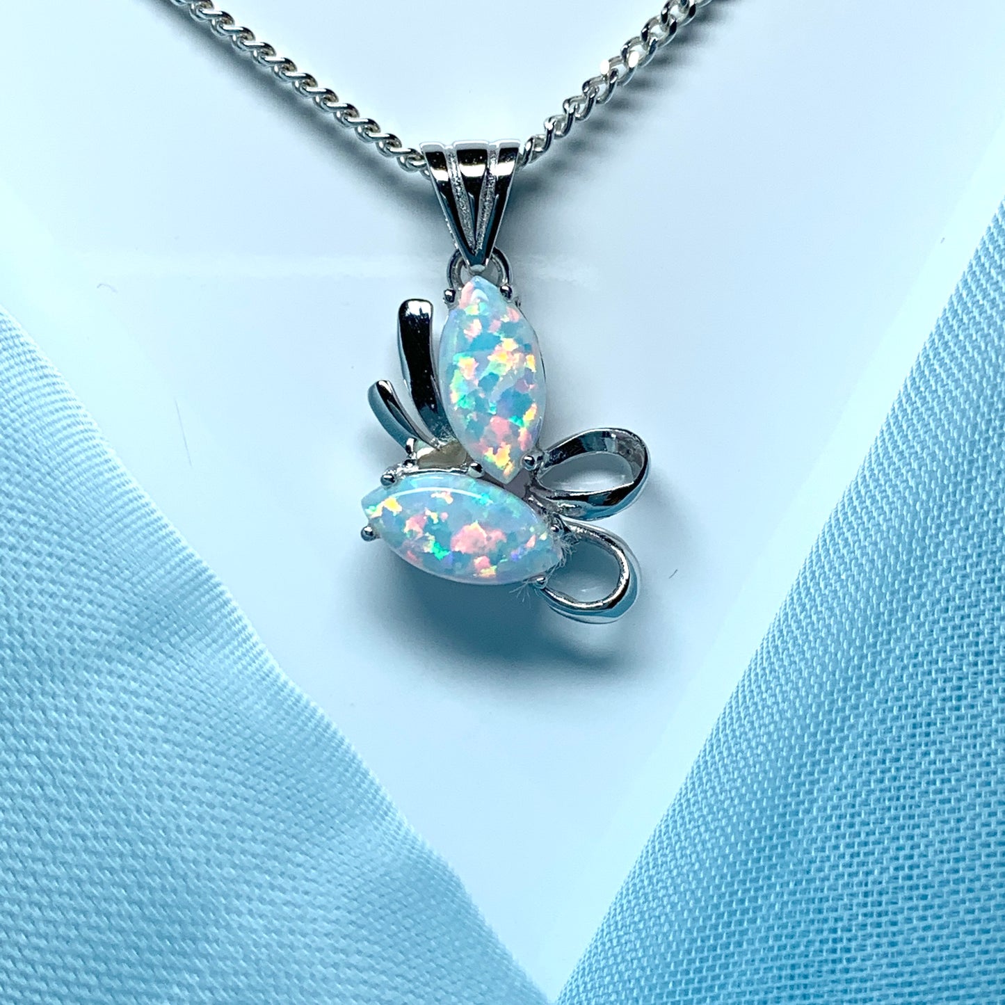 White gold marquise opal swirl necklace