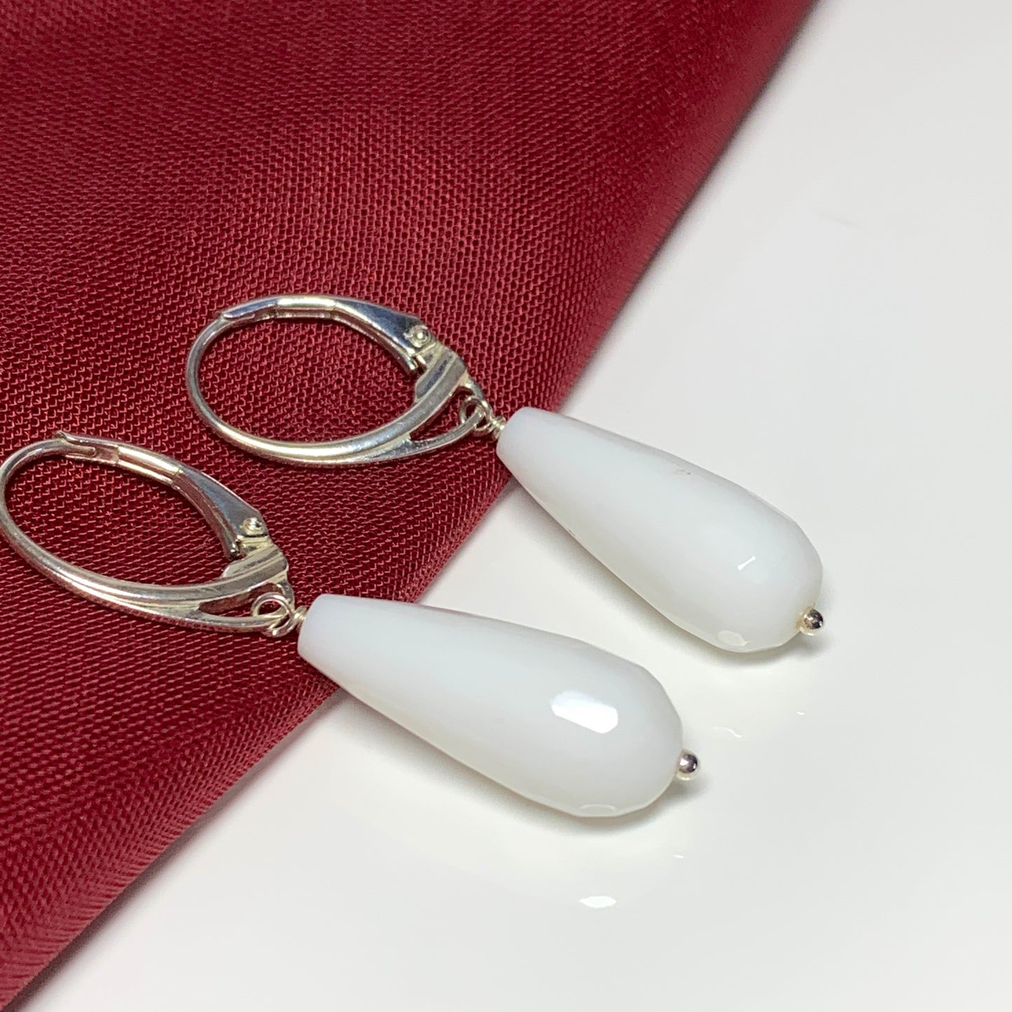 White teardrop shaped agate drop earrings