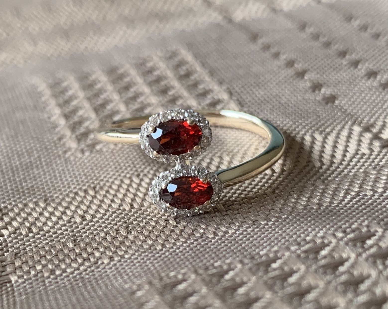 Yellow Gold Crossover Twist Garnet And Diamond Oval Cluster Ring