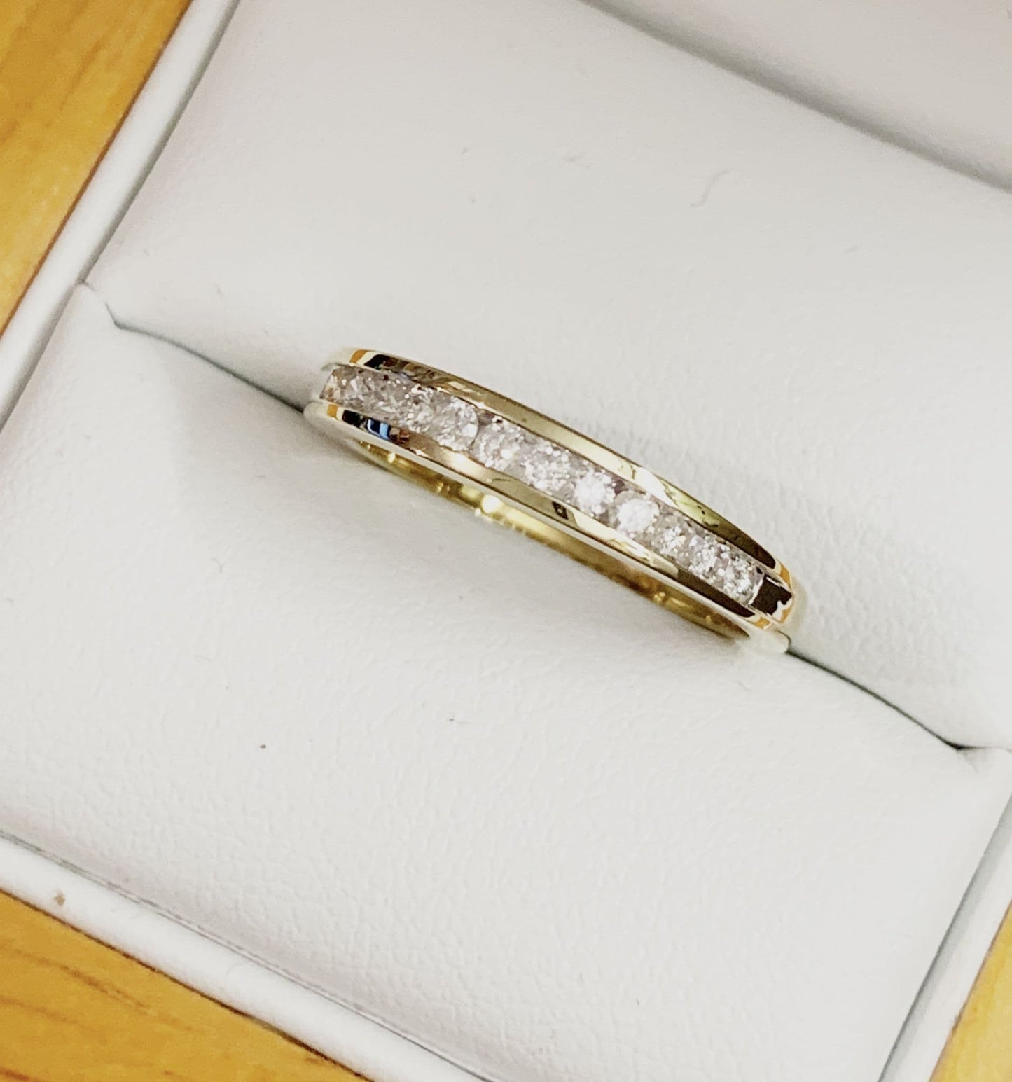 Yellow gold diamond eternity ring channel setting 25 points