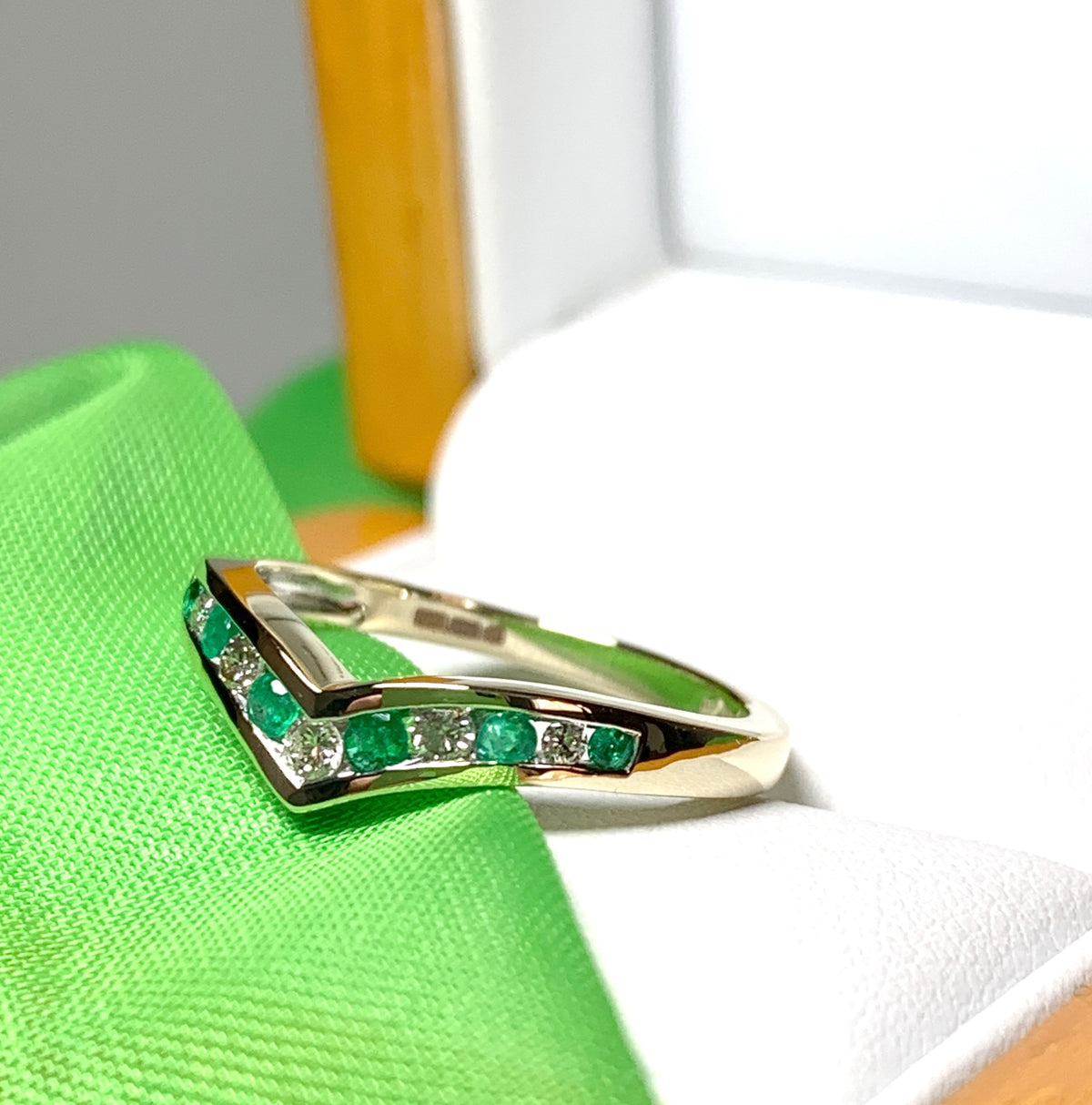Yellow Gold Green Emerald And Diamond Wishbone Ring Rubbed Smooth Over Setting