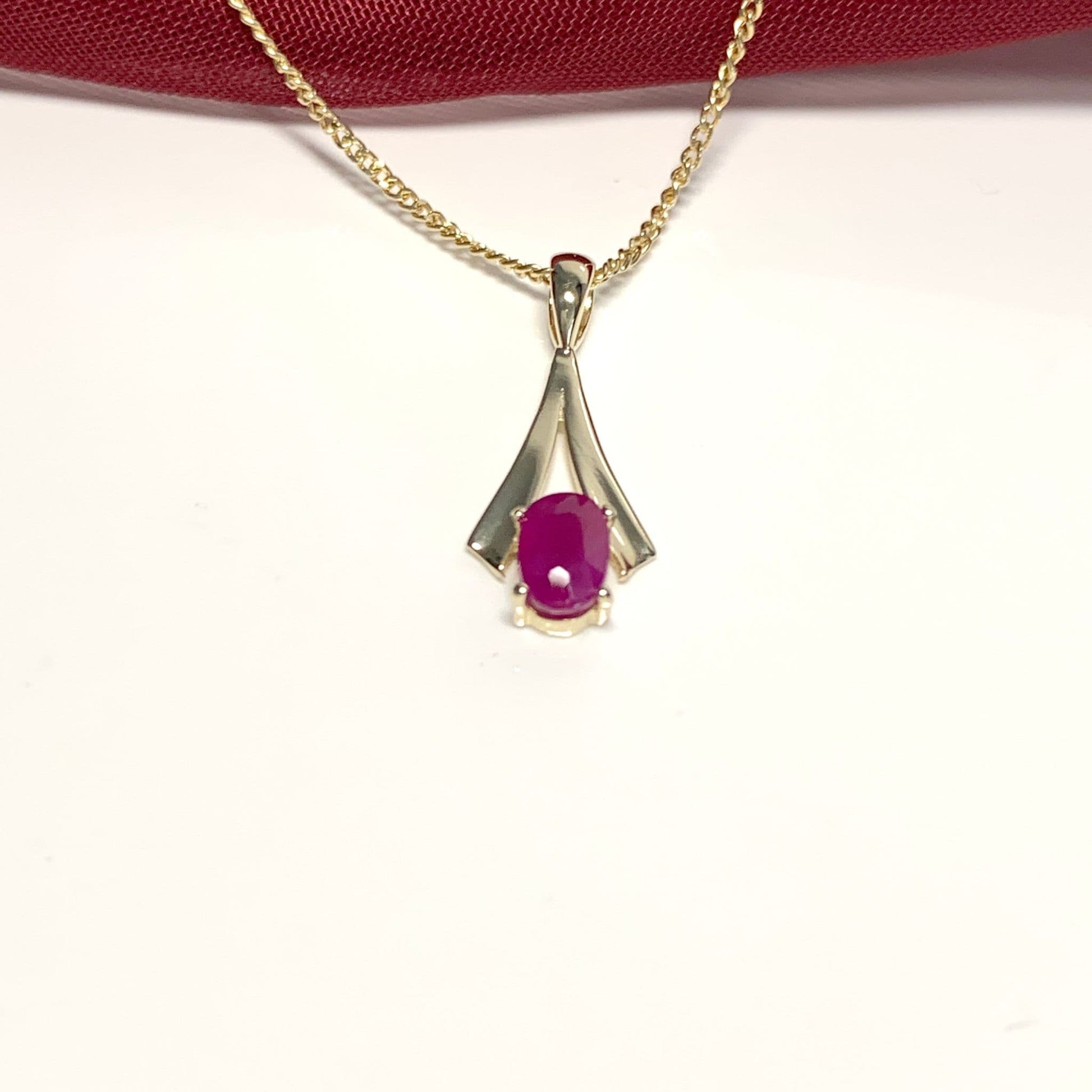Yellow Gold Oval Ruby Necklace