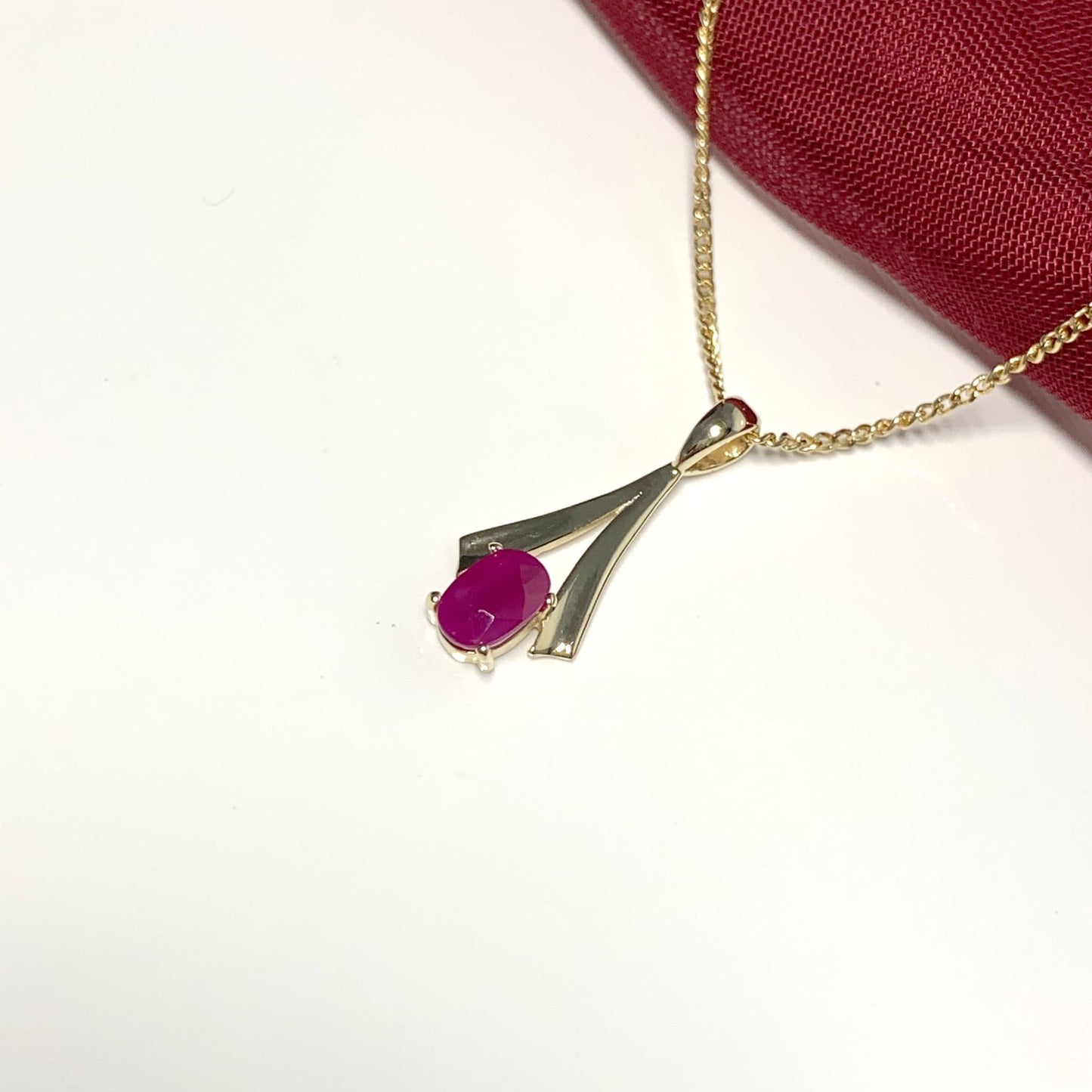 Yellow Gold Oval Ruby Necklace