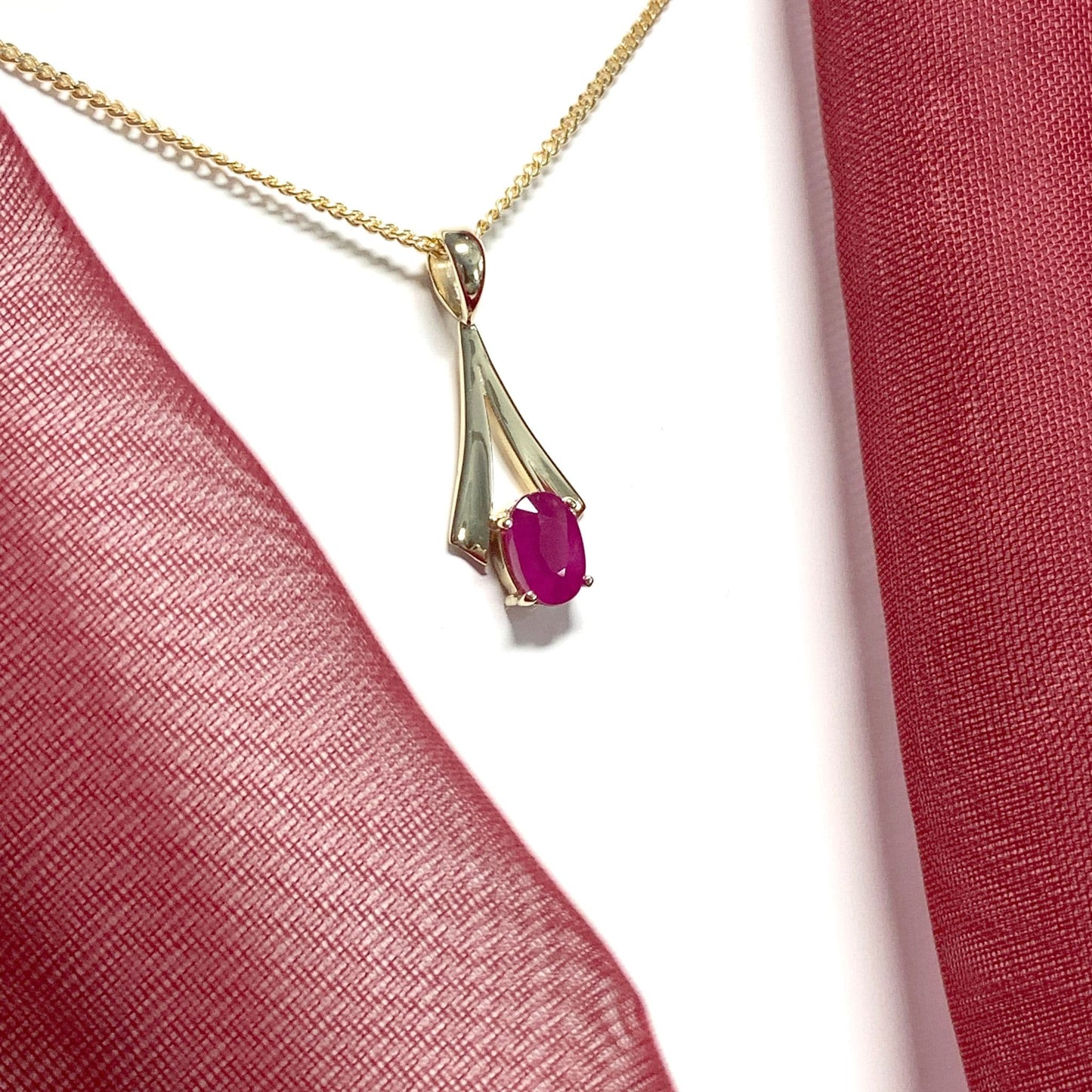 Yellow Gold Oval Ruby Necklace