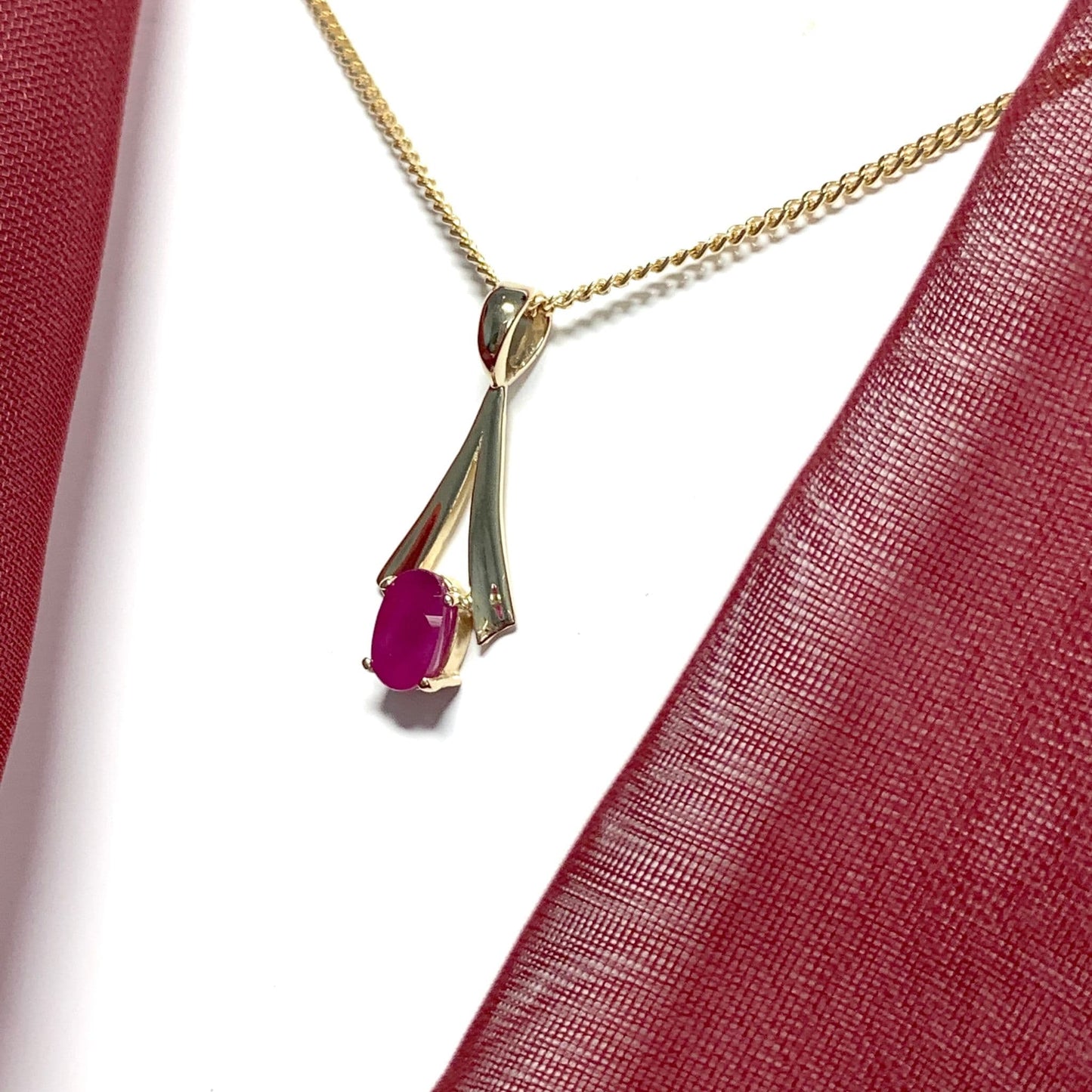 Yellow Gold Oval Ruby Necklace