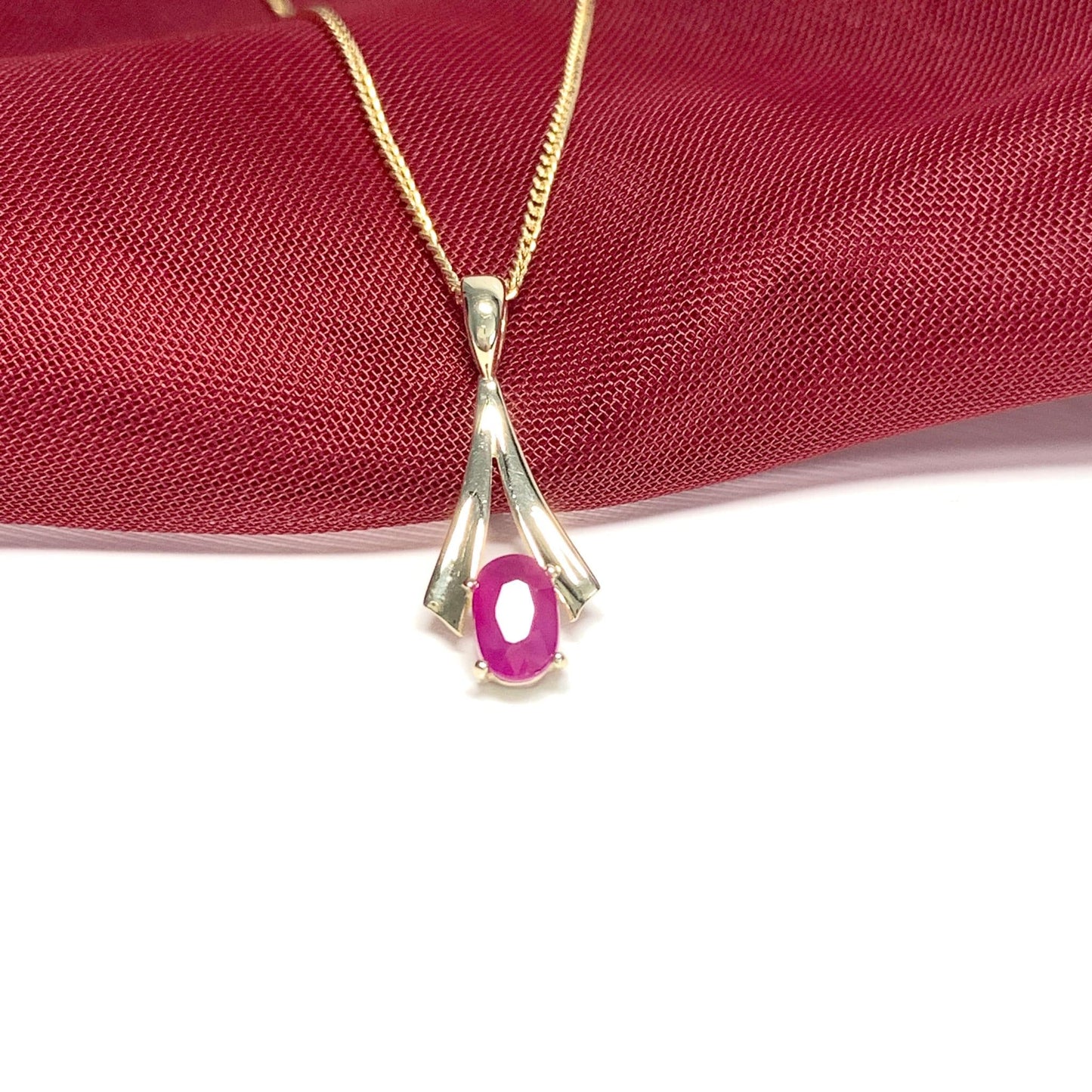 Yellow Gold Oval Ruby Necklace