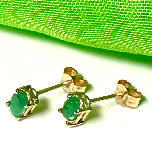 Yellow gold oval green emerald claw set studs