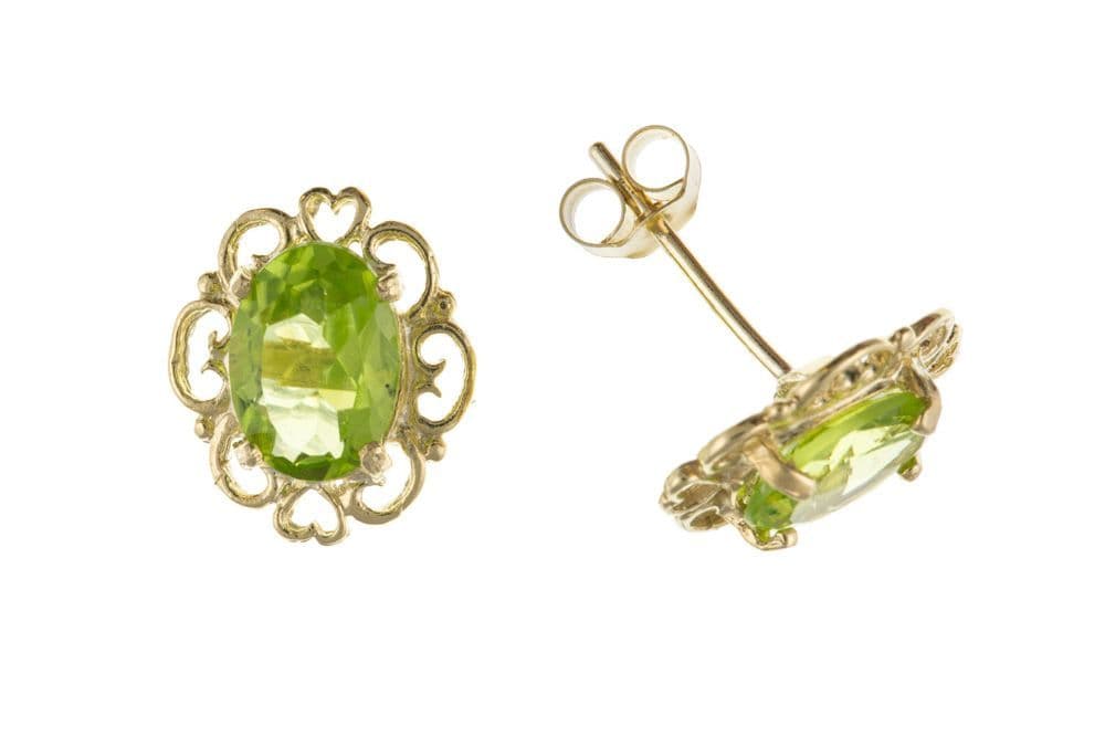 Yellow gold oval peridot stud earrings