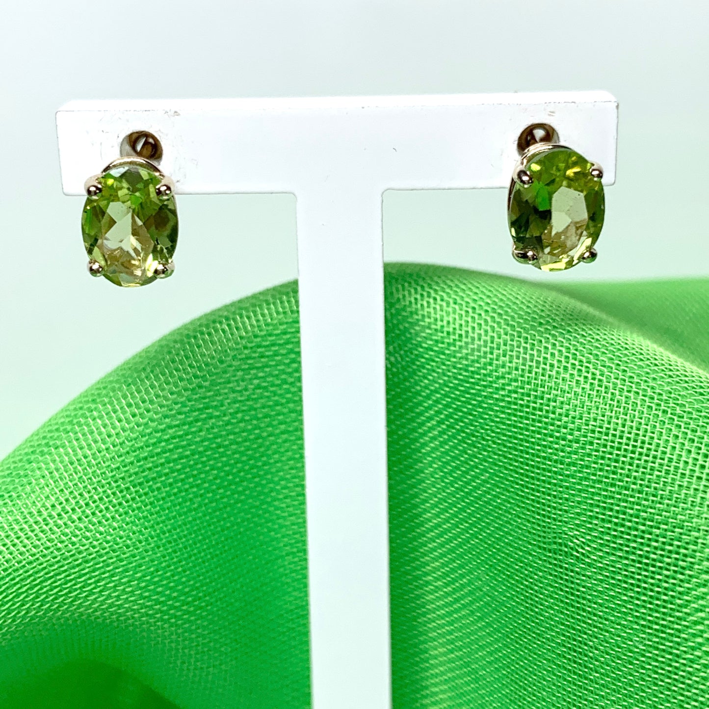 Yellow gold peridot oval stud earrings