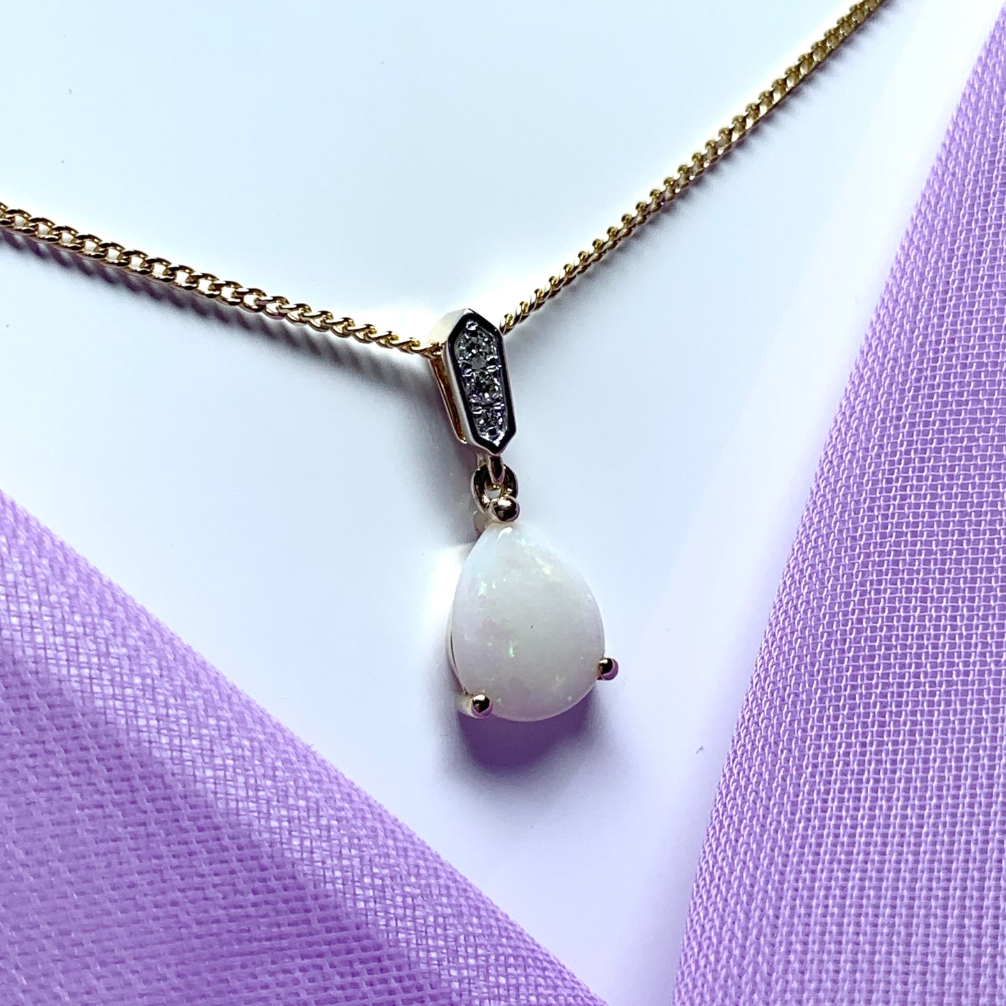 Yellow gold real opal and diamond pear shaped necklace