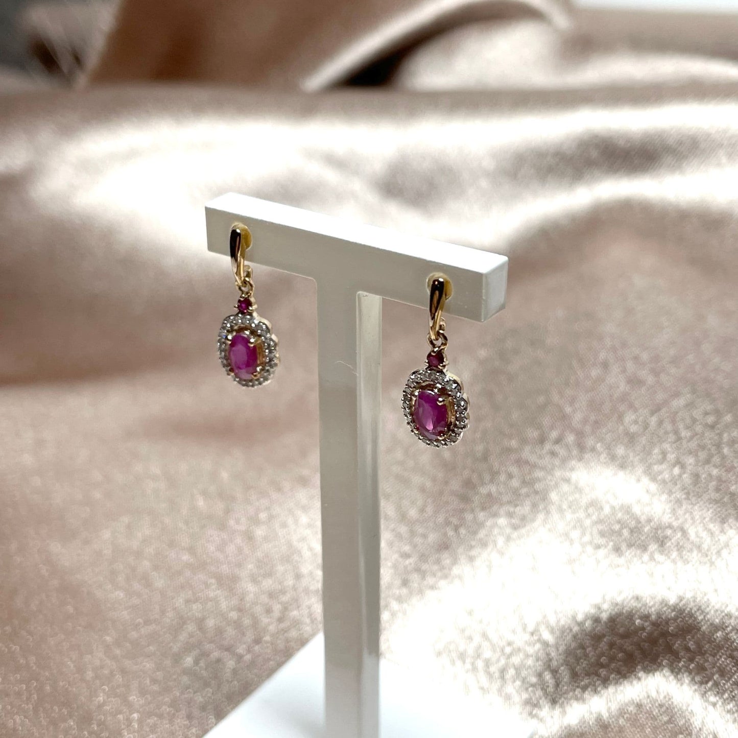 Yellow gold red oval ruby and diamond drop earrings