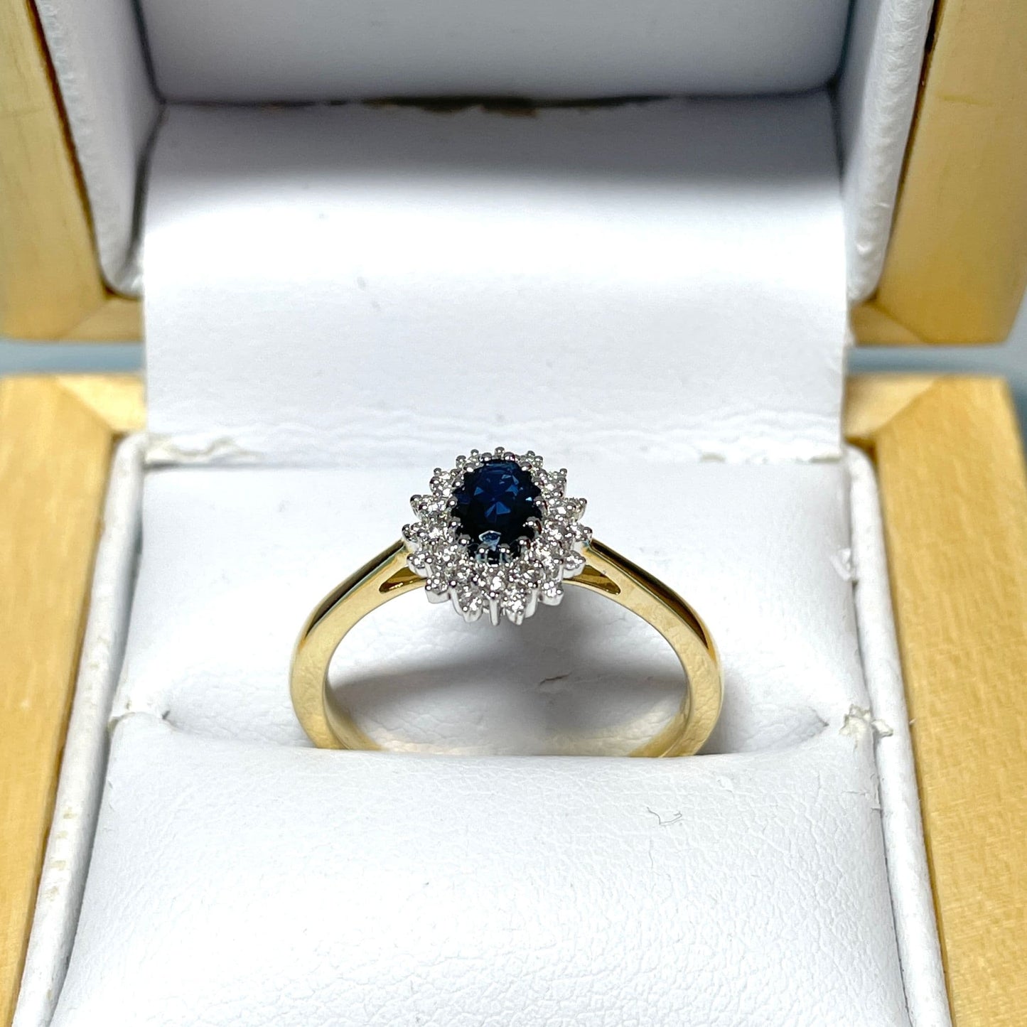 Oval Blue Sapphire and Double Diamond Yellow Gold Cluster Ring