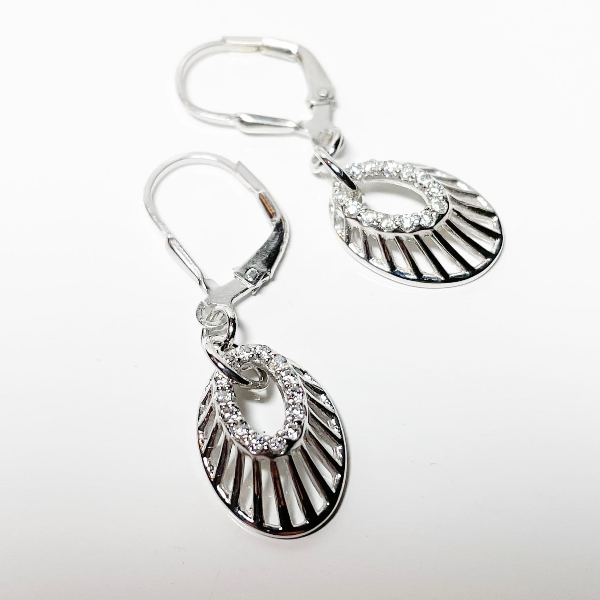 an Oval shaped cubic zirconia sterling silver drop earrings