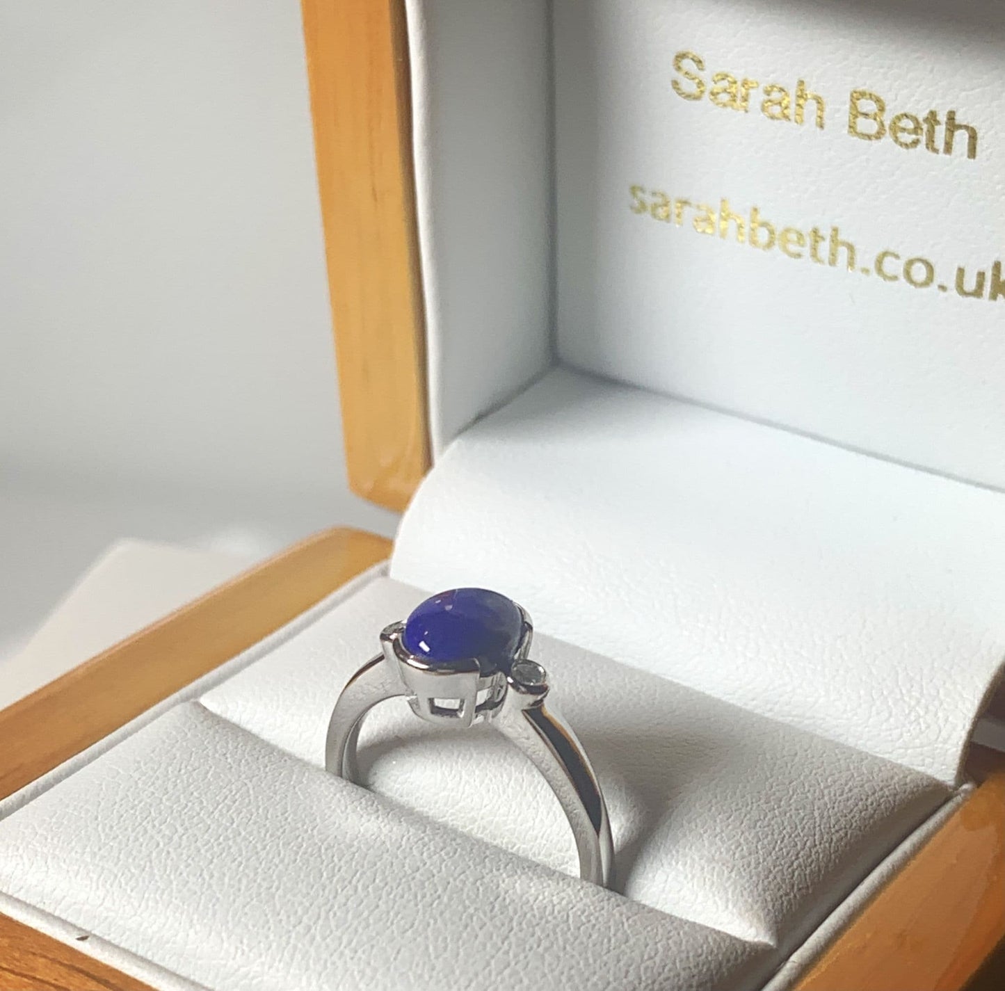 Blue lapis lazuli and diamond oval white gold ladies ring