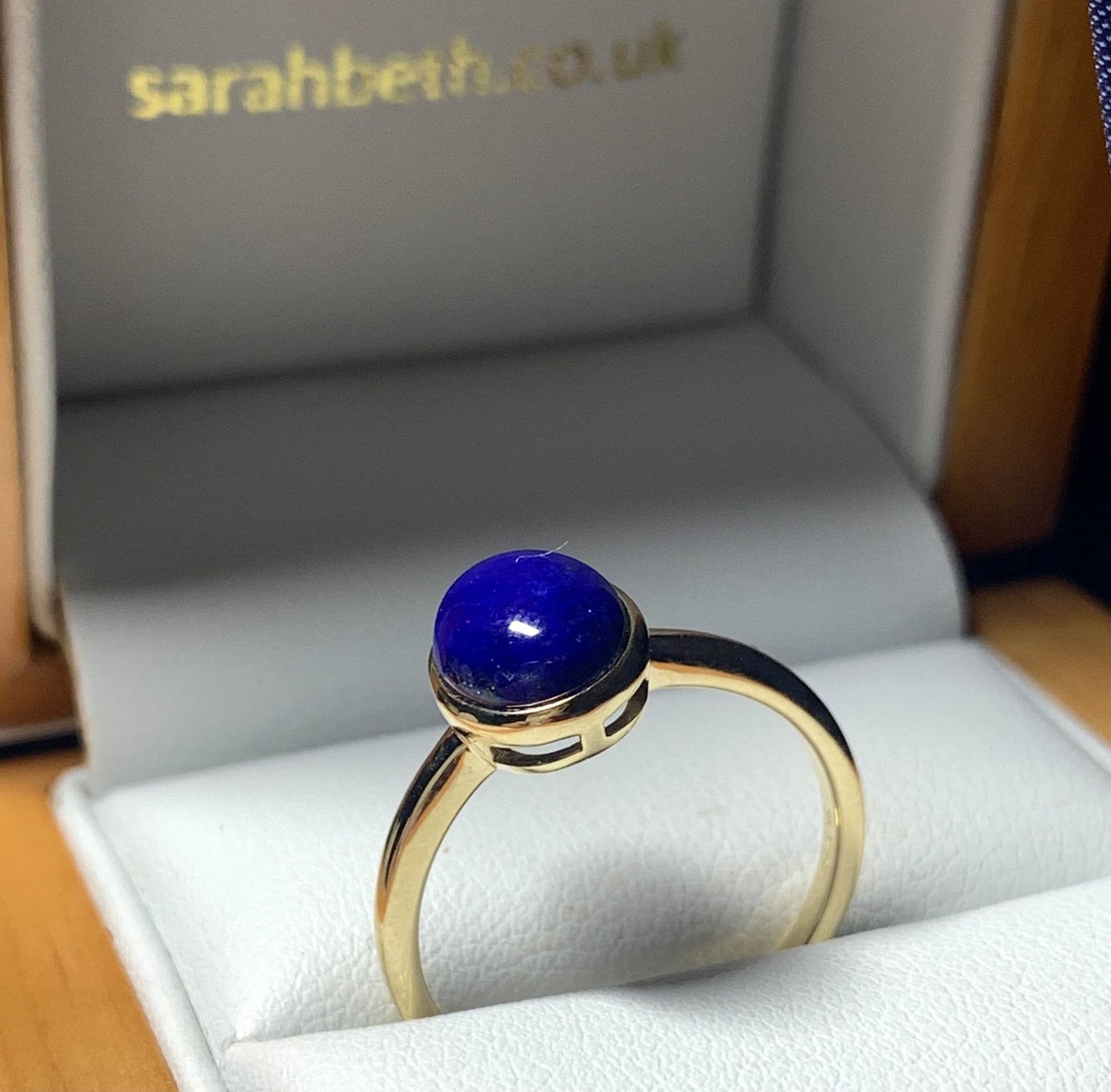 Blue lapis lazuli oval yellow gold ladies ring