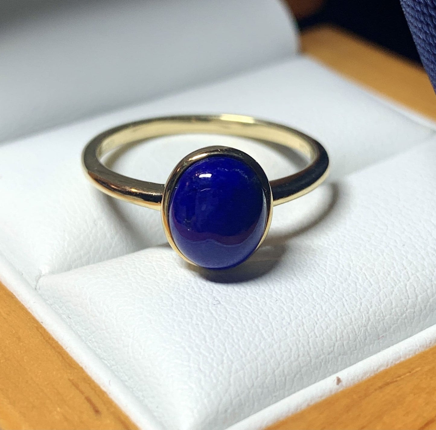 Blue lapis lazuli oval yellow gold ladies ring