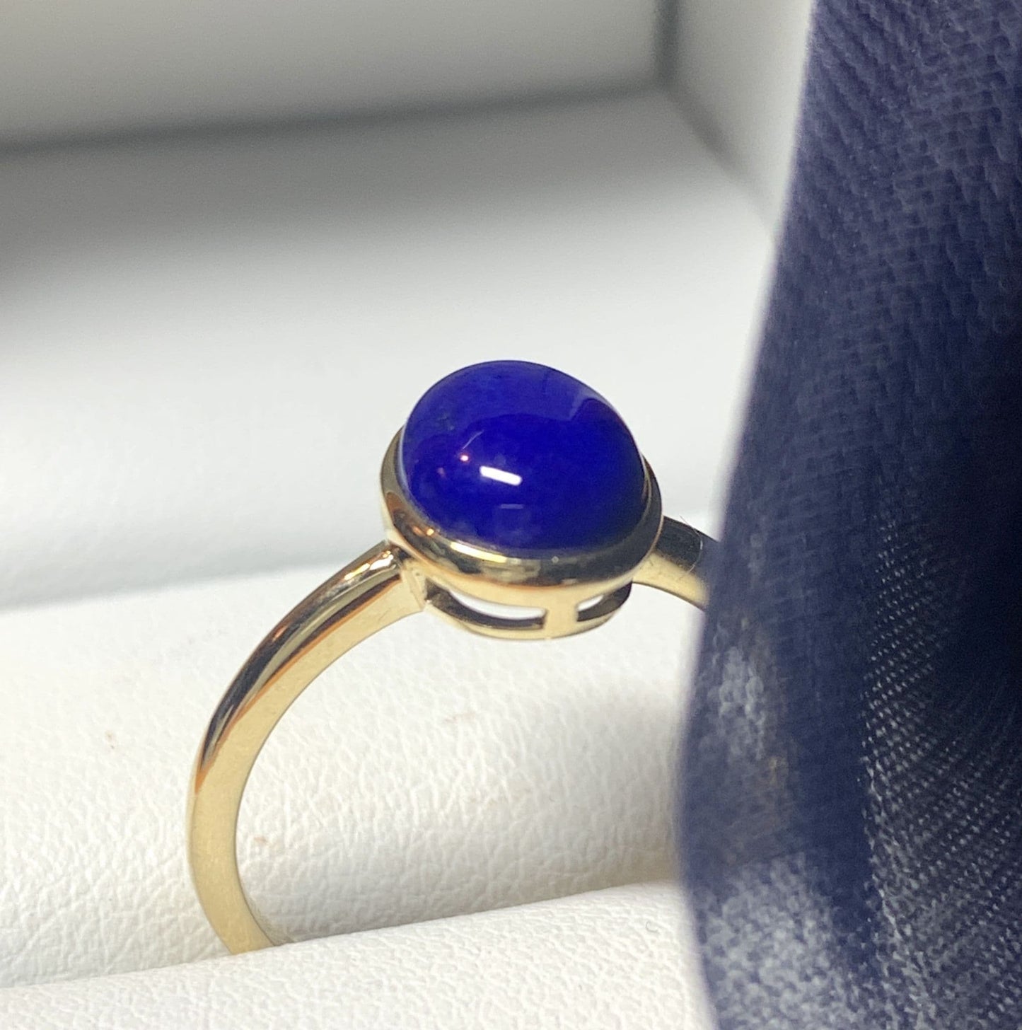 Blue lapis lazuli oval yellow gold ladies ring