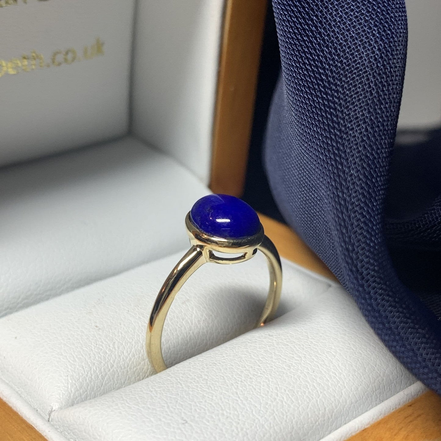 Blue lapis lazuli oval yellow gold ladies ring