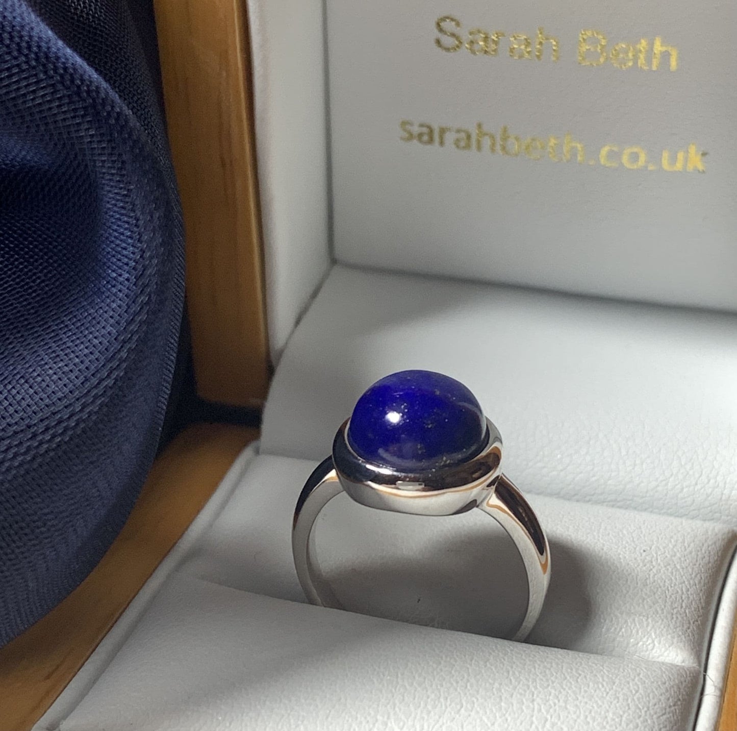 Blue lapis lazuli round white gold ladies ring