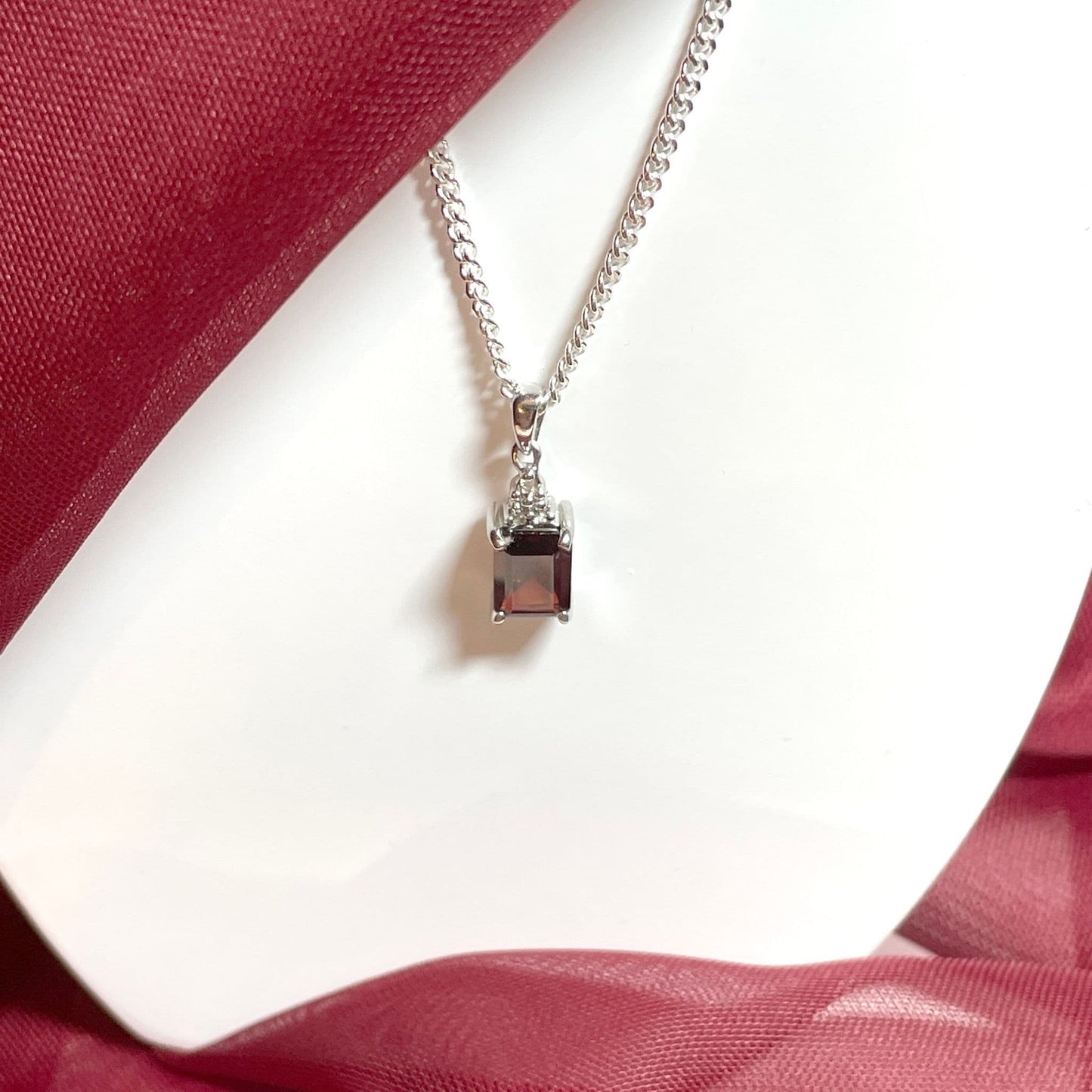 Garnet and diamond sterling silver baguette necklace