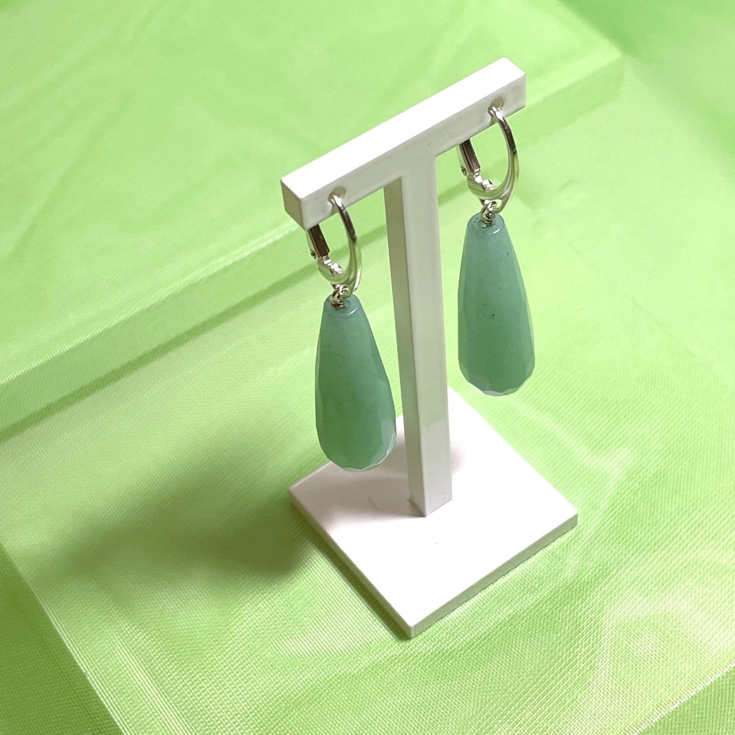 Green jade long teardrop shaped sterling silver drop earrings