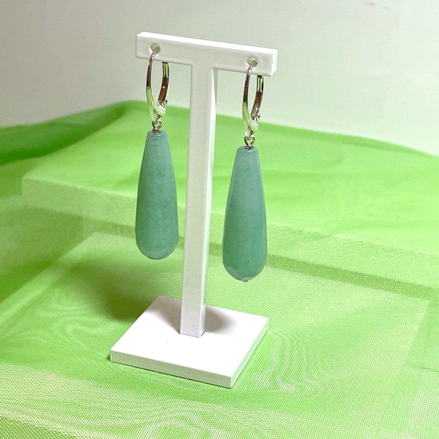 Green jade long teardrop shaped sterling silver drop earrings