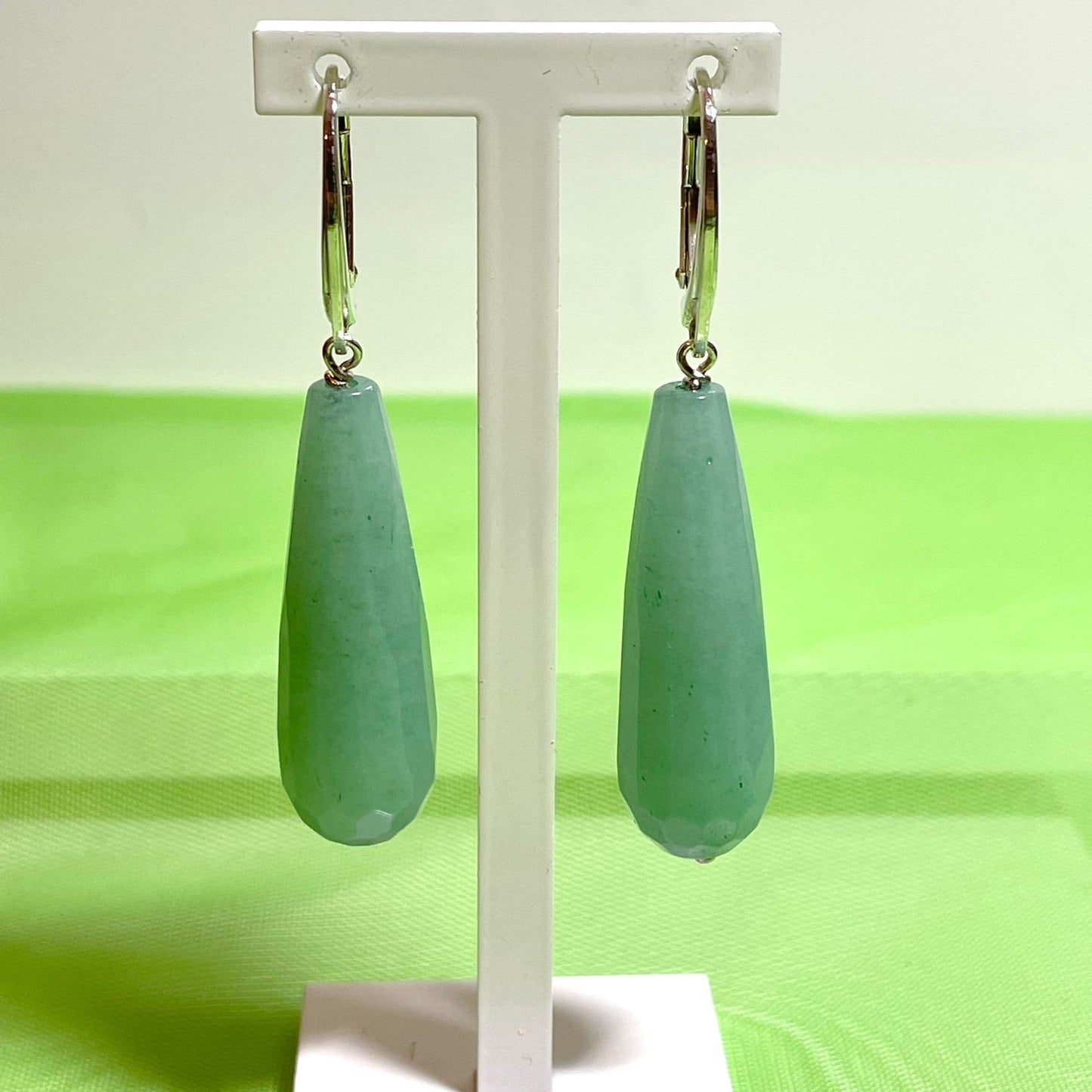 Green jade long teardrop shaped sterling silver drop earrings