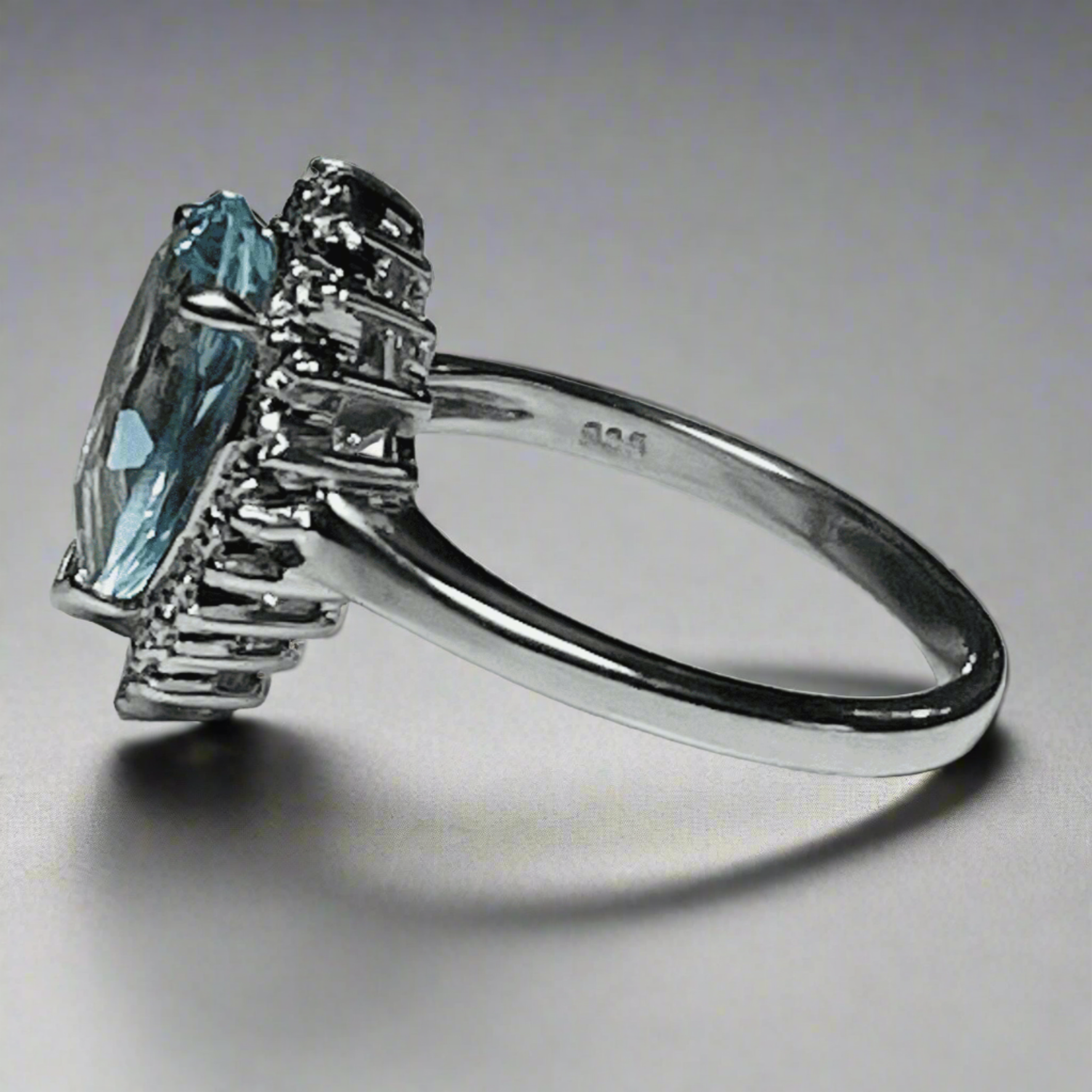 Large pear shaped blue topaz and diamond sterling silver cluster ring