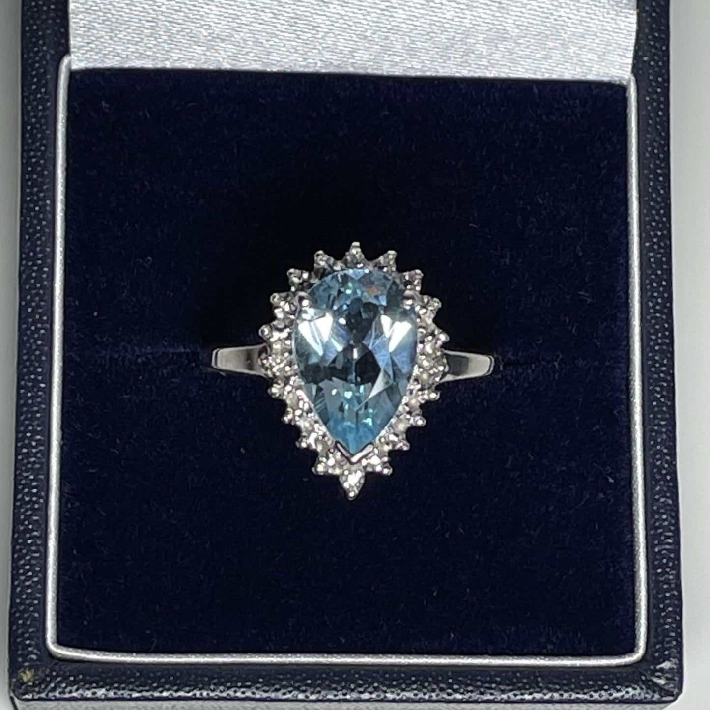 Large pear shaped blue topaz and diamond sterling silver cluster ring