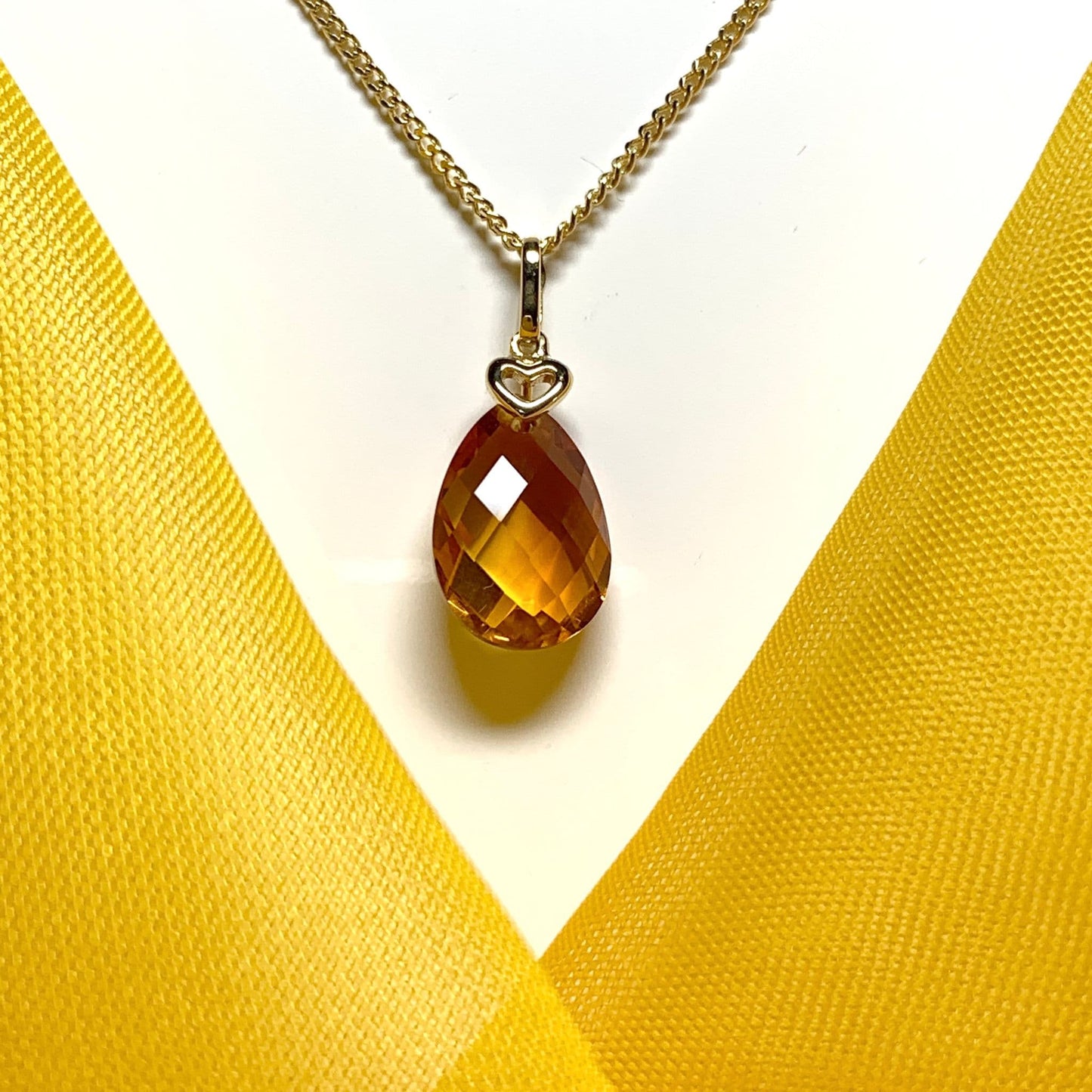 Large pear shaped yellow citrine gold necklace with gold heart