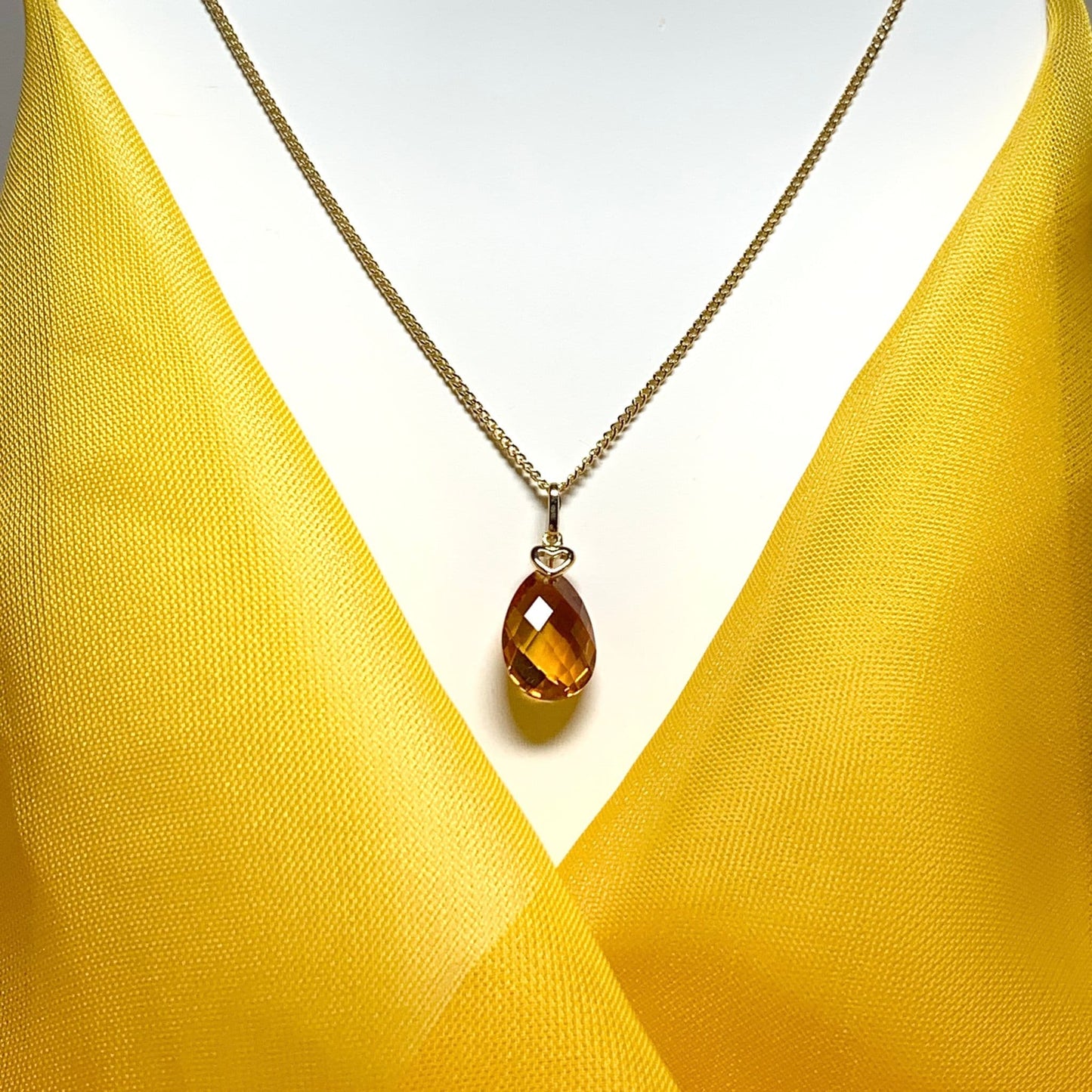 Large pear shaped yellow citrine gold necklace with gold heart