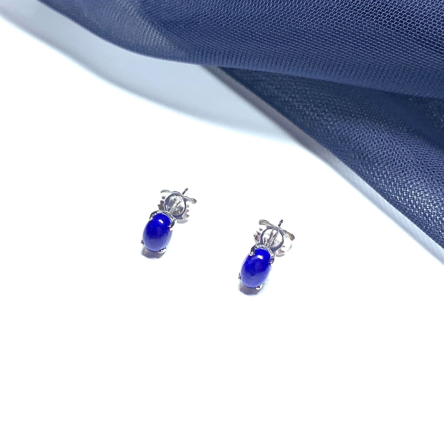 Oval blue lapis lazuli white gold earrings