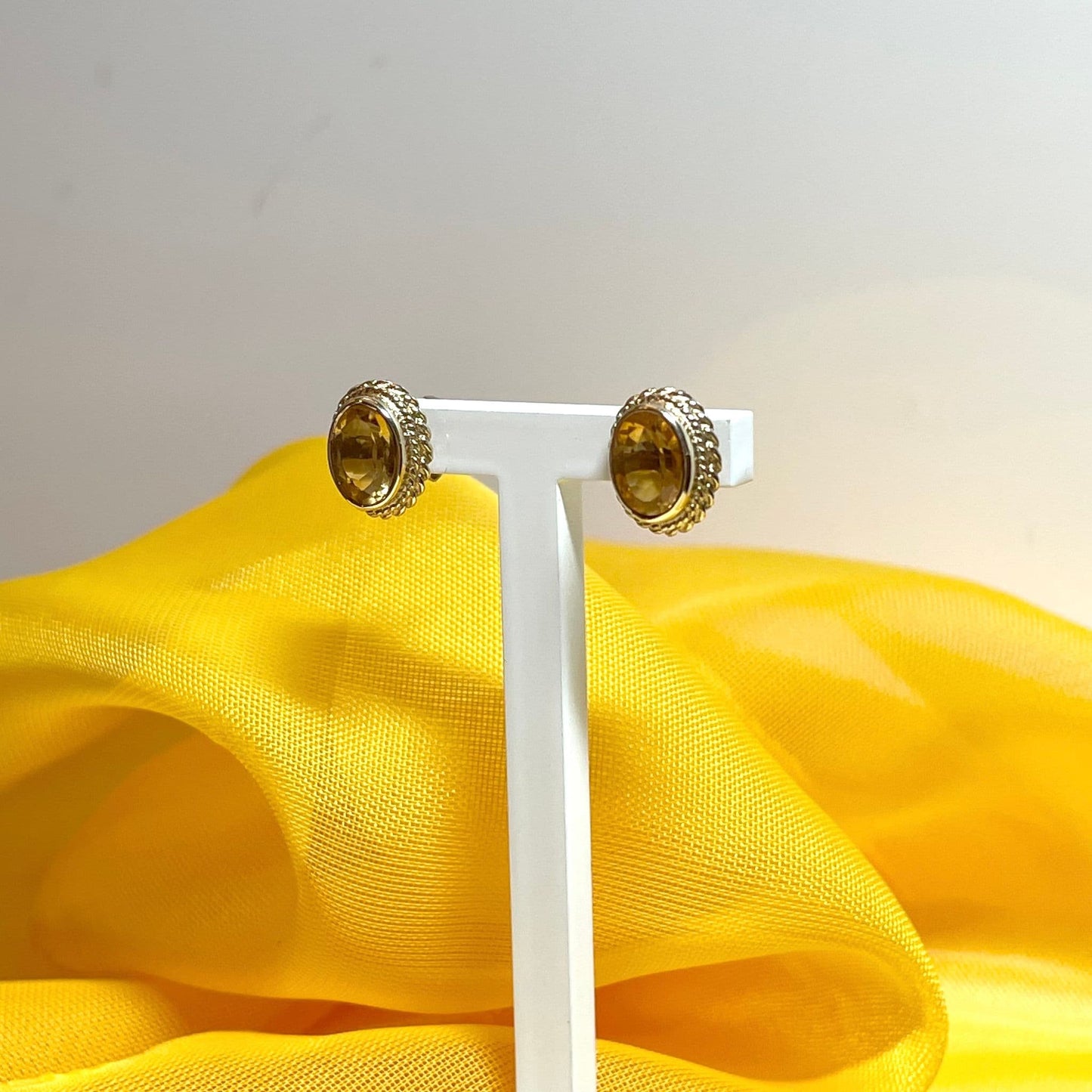 Oval citrine yellow gold stud earrings