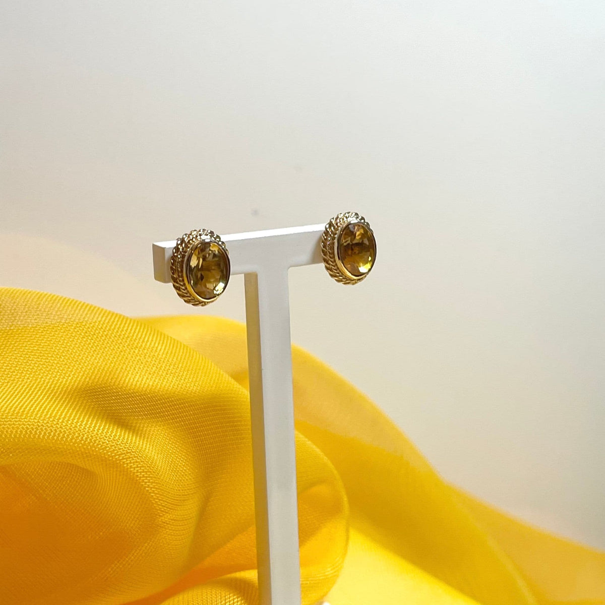 Oval citrine yellow gold stud earrings