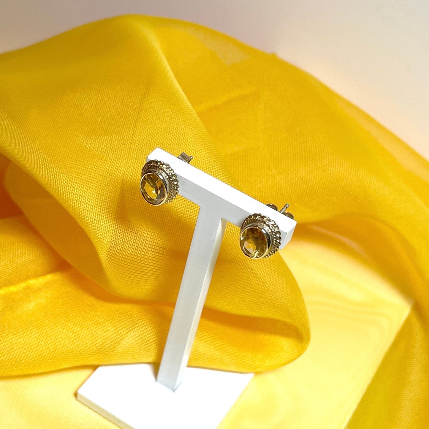 Oval citrine yellow gold stud earrings