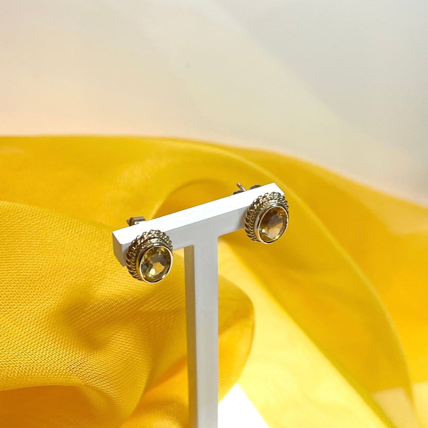 Oval citrine yellow gold stud earrings