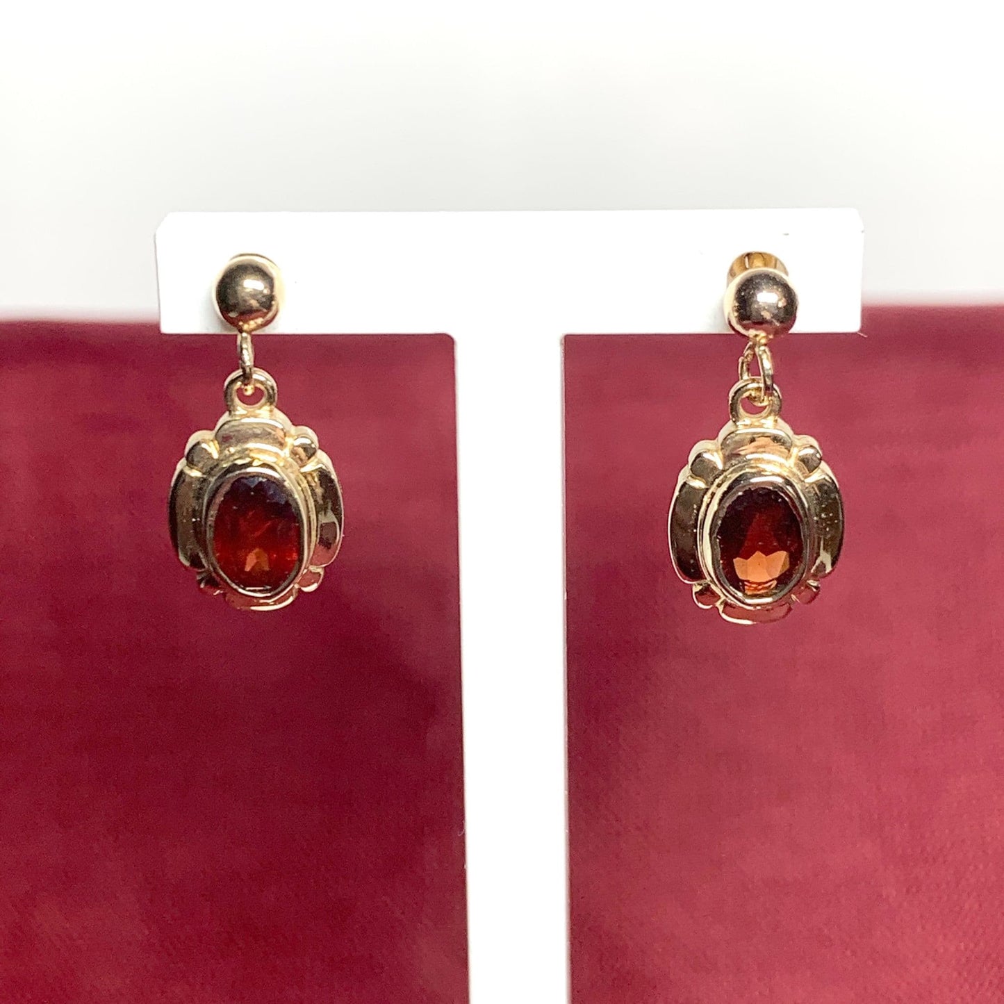 Garnet drop earrings oval picture framed yellow gold