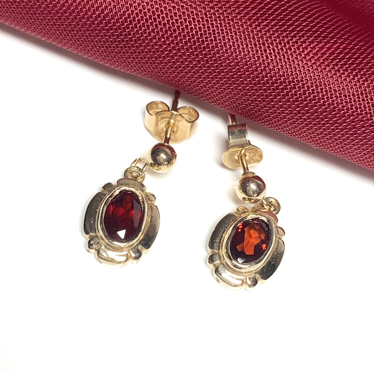 Garnet drop earrings oval picture framed yellow gold