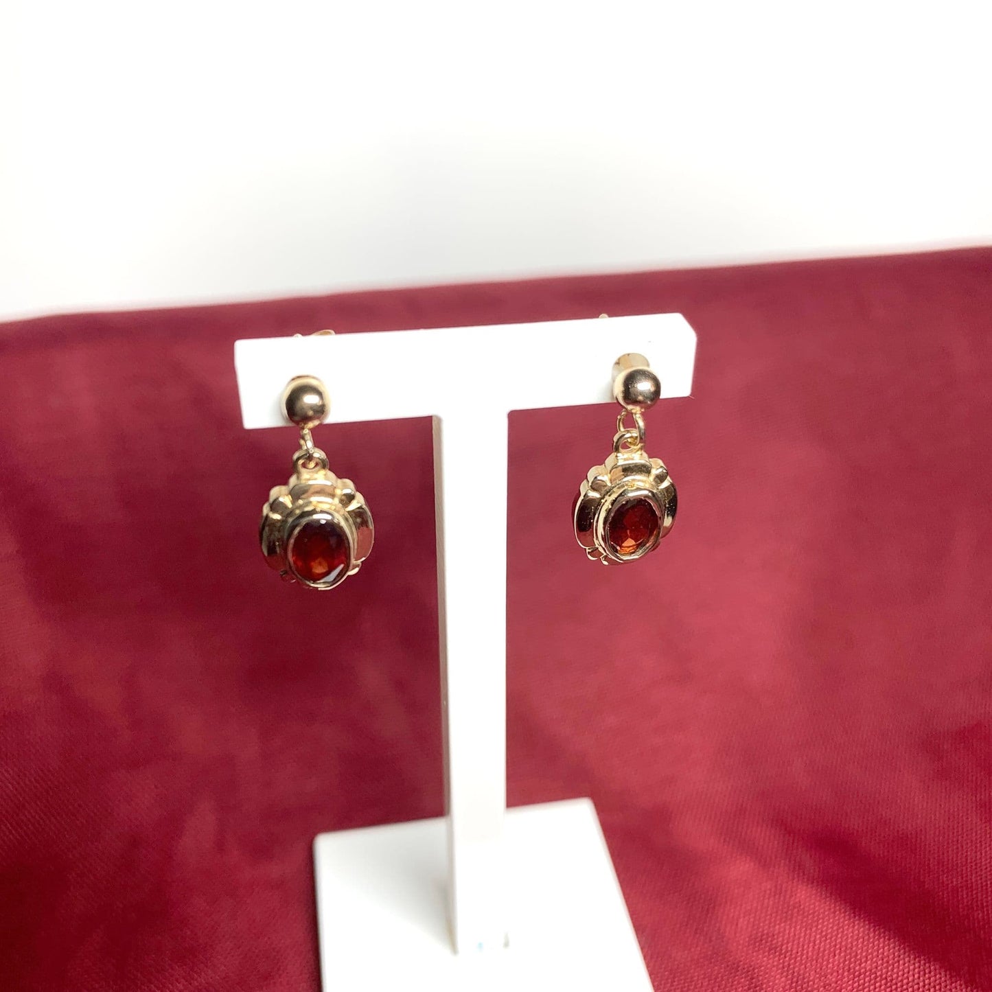 Garnet drop earrings oval picture framed yellow gold