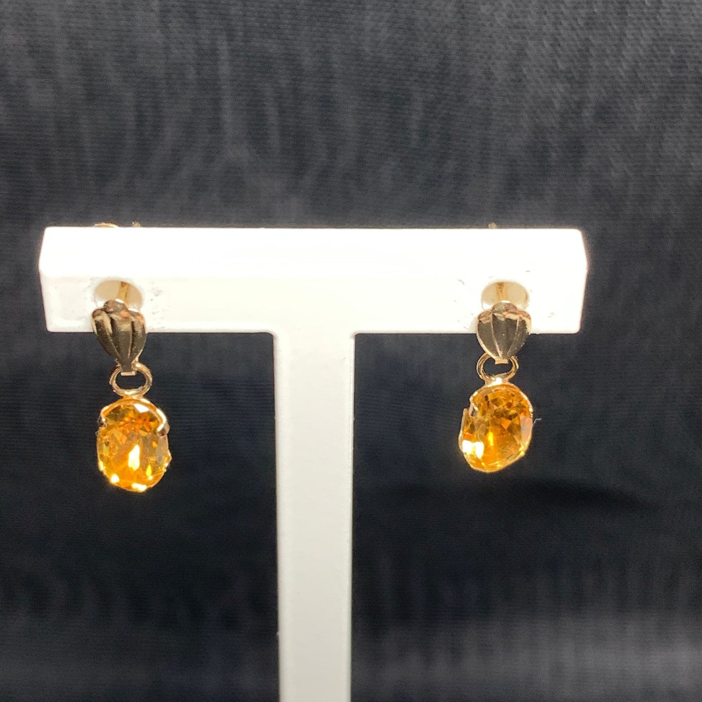 Oval shaped citrine yellow gold earrings