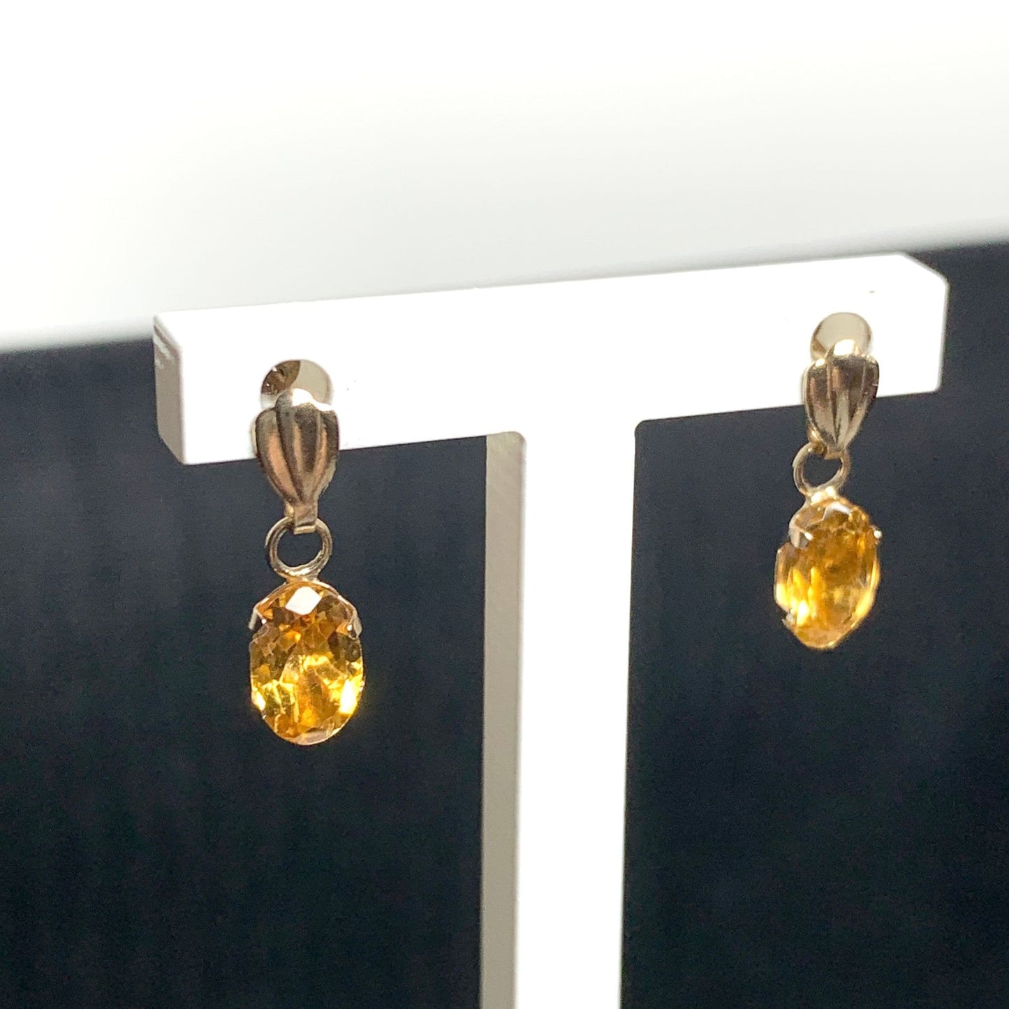 Oval shaped citrine yellow gold earrings