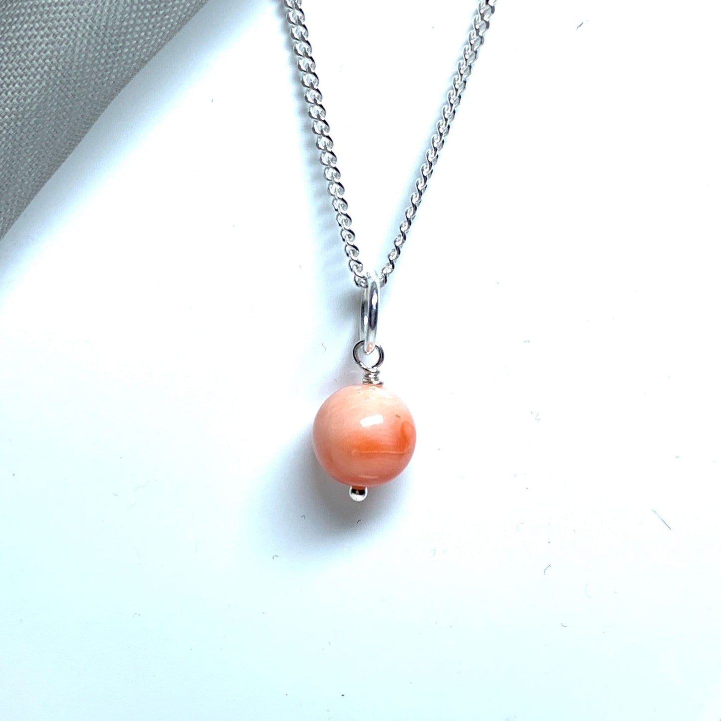 Round coral sterling silver necklace