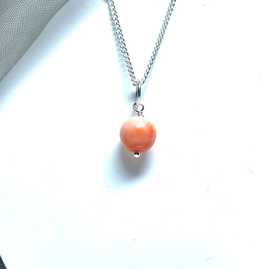 Round coral sterling silver necklace