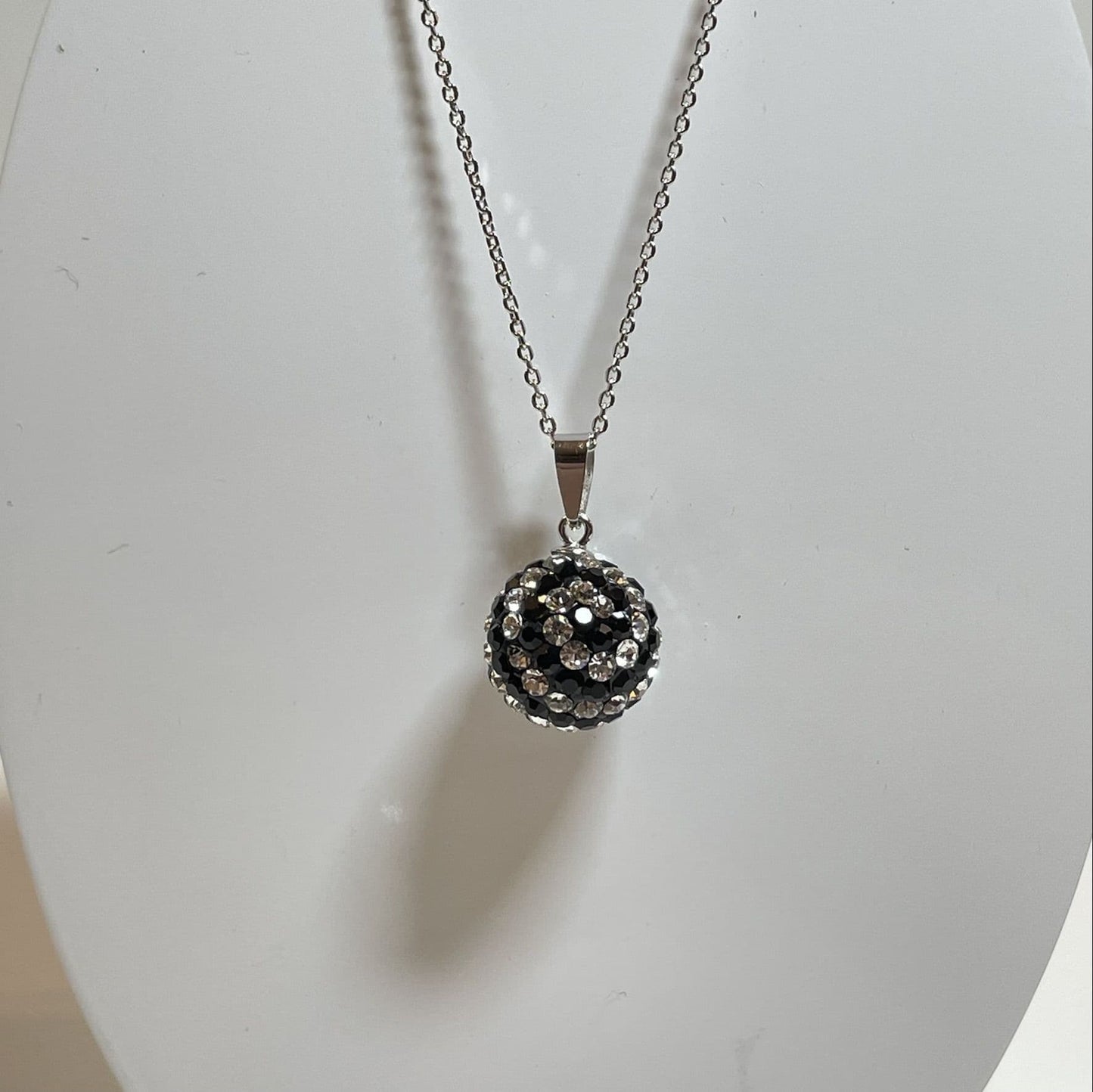 Tresor Paris crystal necklace 12 mm white and black bon bon round disco glitter ball pendant