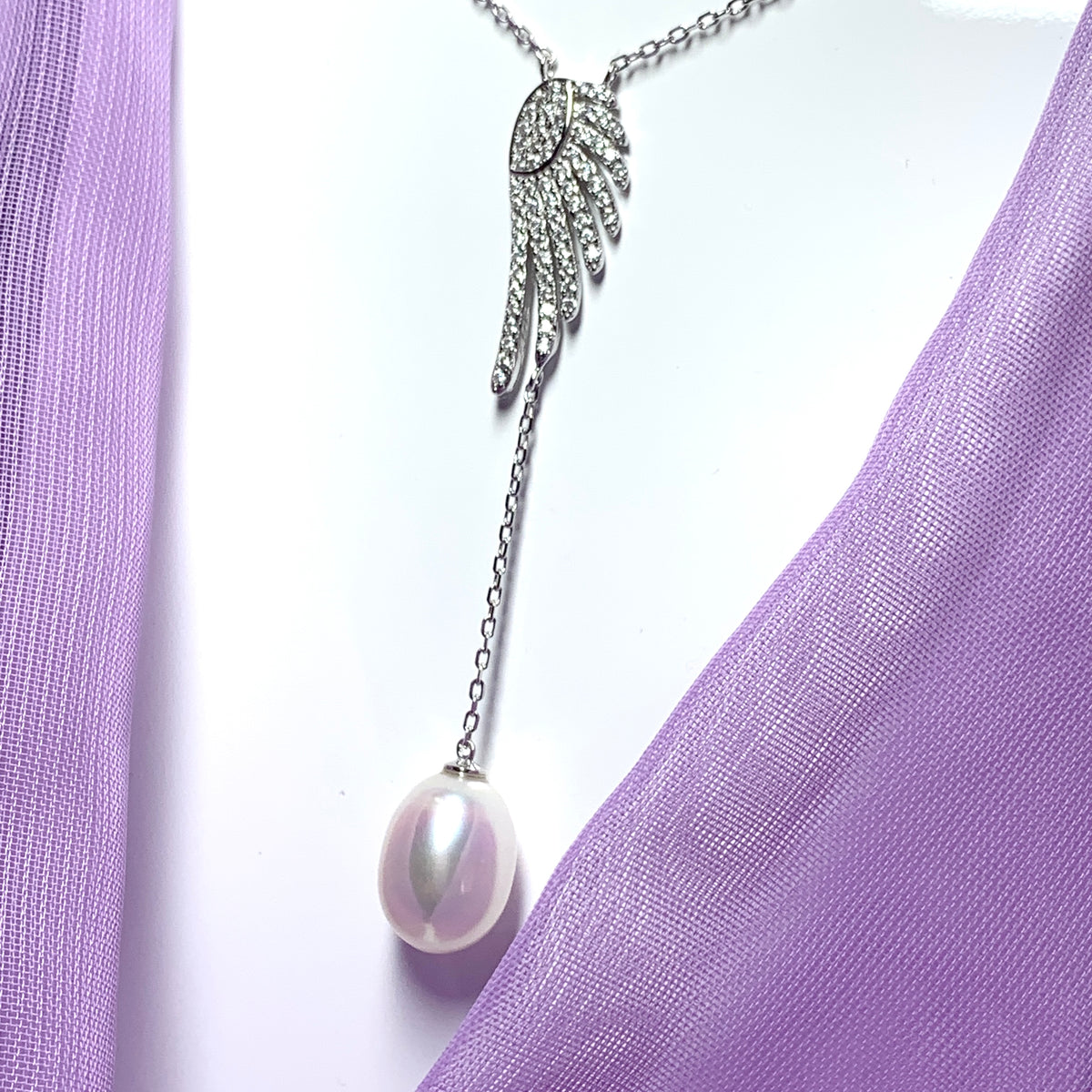 Angle Wing Cubic Zirconia and Fresh Water Pearl Necklace Pendant