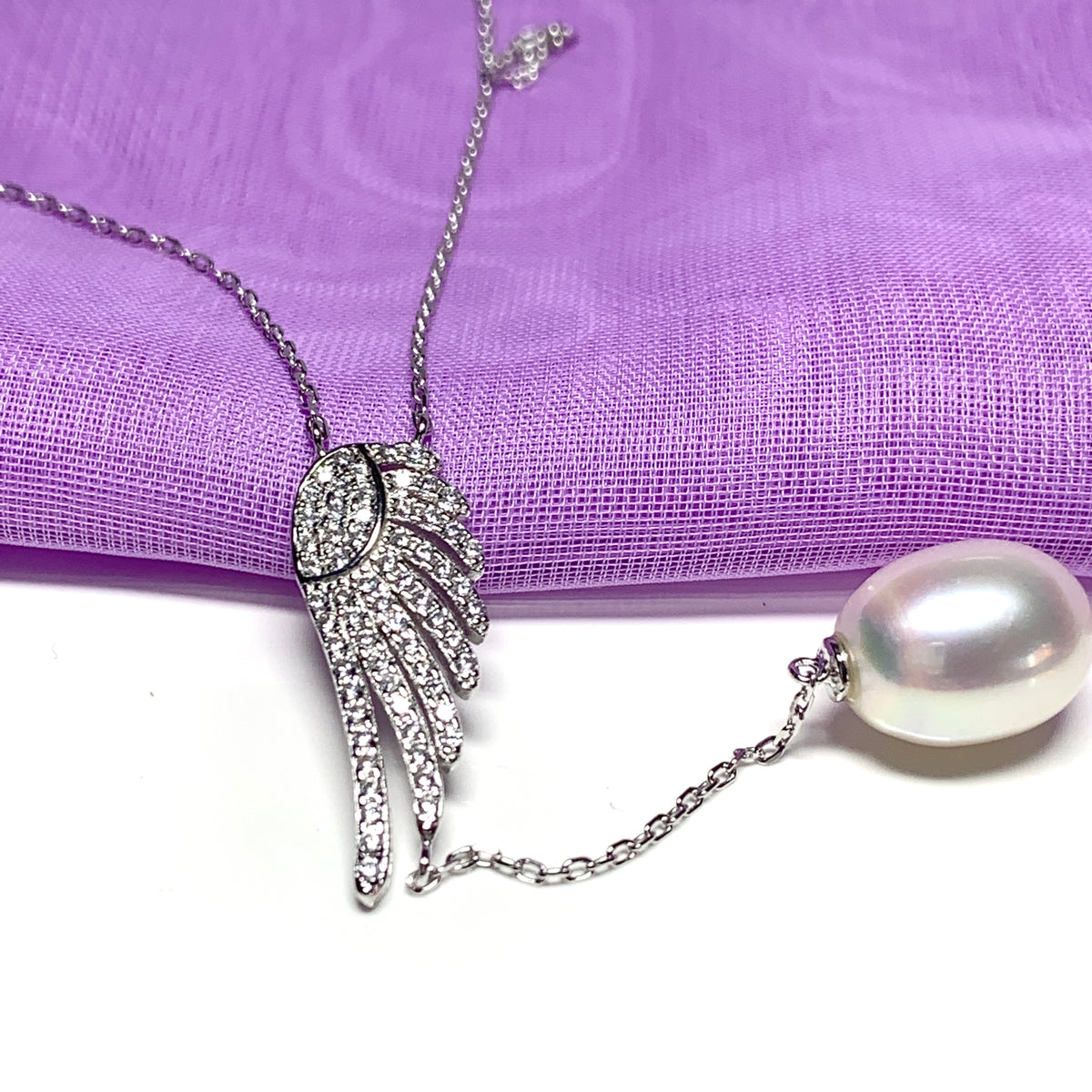 Angle Wing Cubic Zirconia and Fresh Water Pearl Necklace Pendant