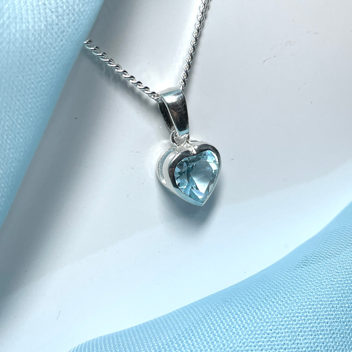Heart shaped blue topaz sterling silver necklace pendant