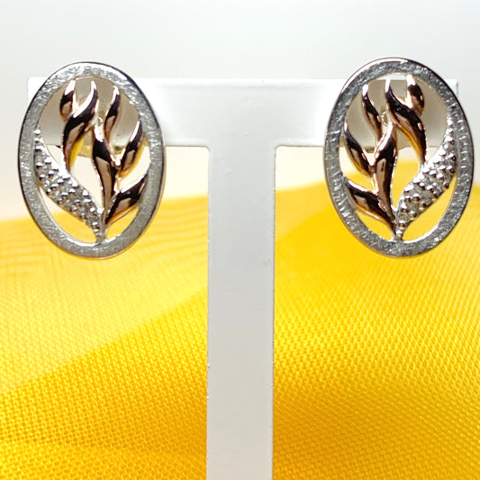 Oval silver fancy earrings